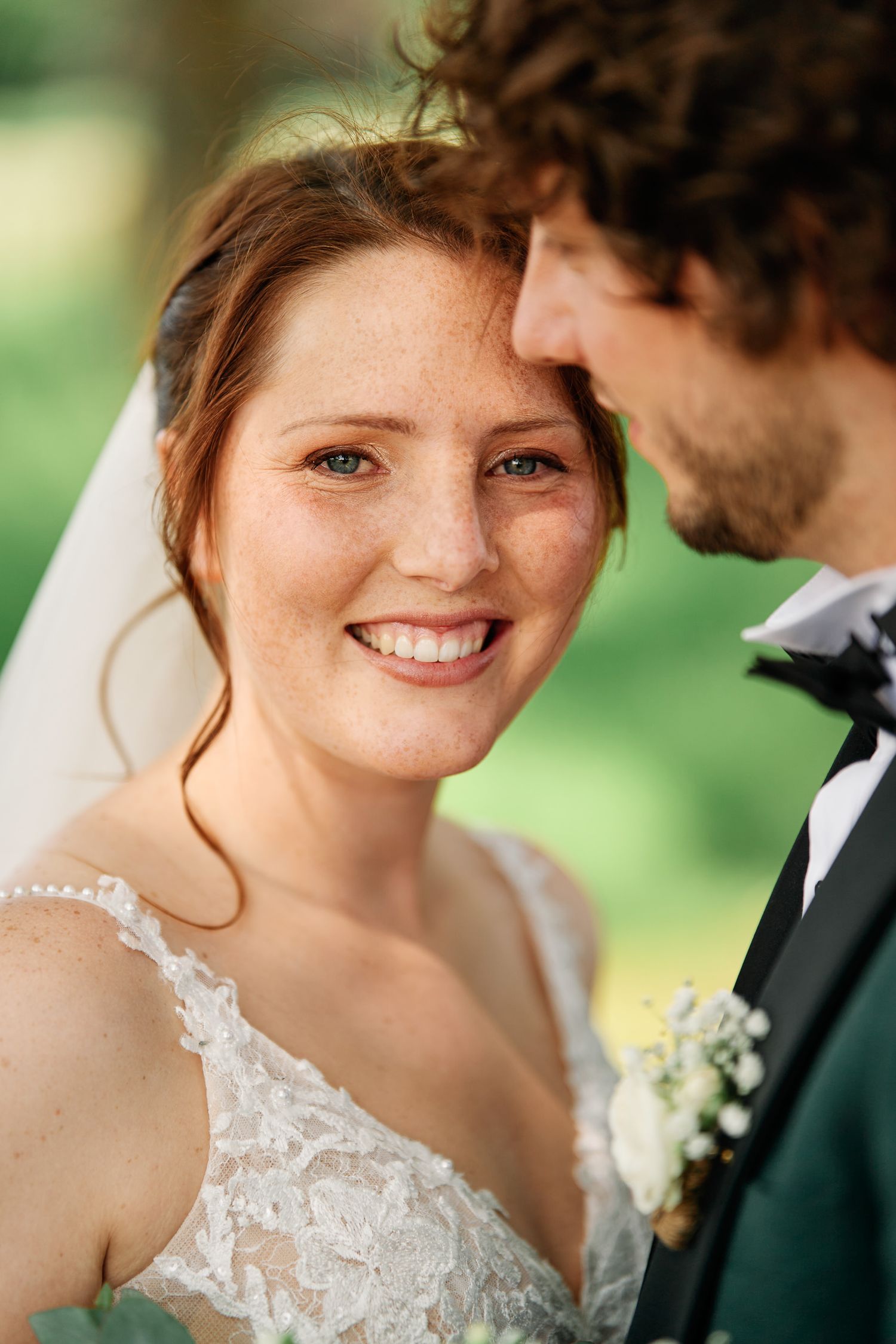 A series of intimate wedding portraits showing tender moments between newlyweds in a natural outdoor setting.