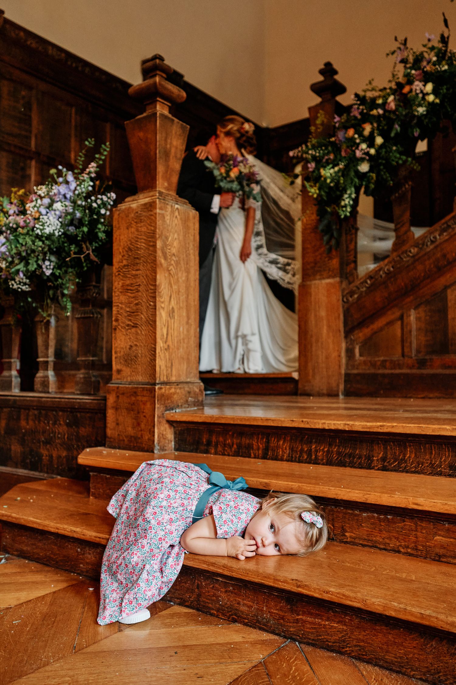 A creative sequence of photos showing a person dramatically falling down wooden church pews in a humorous staged scene.