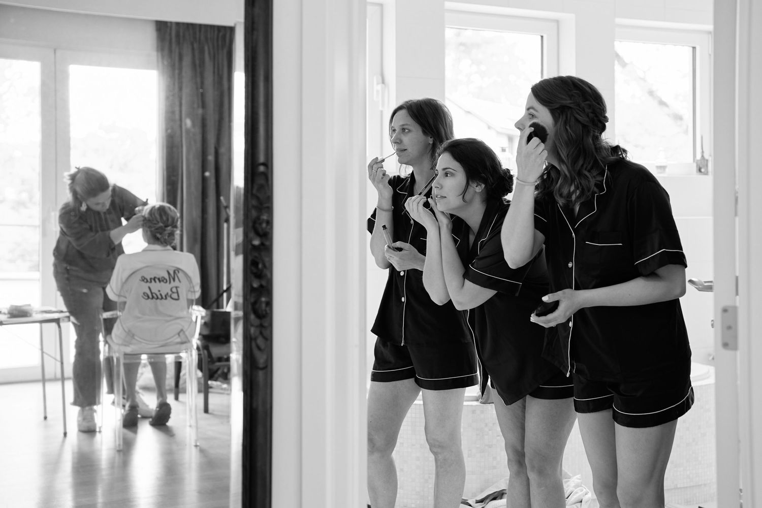 A black and white panoramic collage shows dancers practicing in a mirrored studio space.