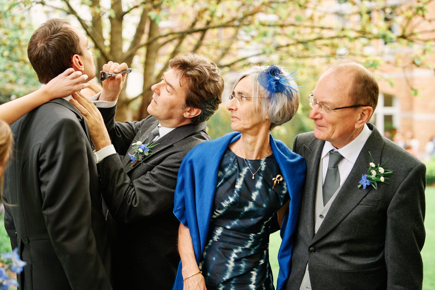 A series of candid moments showing people laughing and embracing during an outdoor wedding celebration.