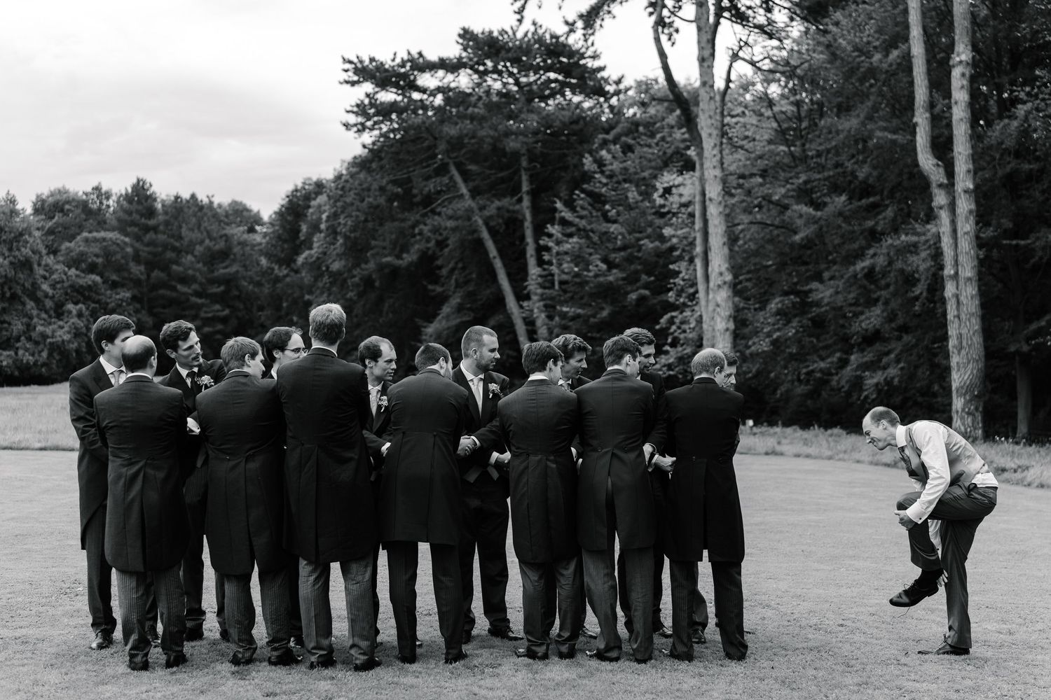A series of black and white photos showing a group in formal attire standing in a line outdoors.