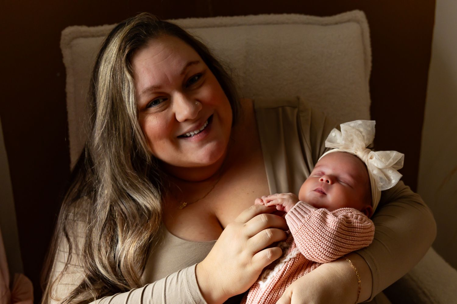 A series of six connected photos showing tender moments between a mother and newborn baby in soft lighting.