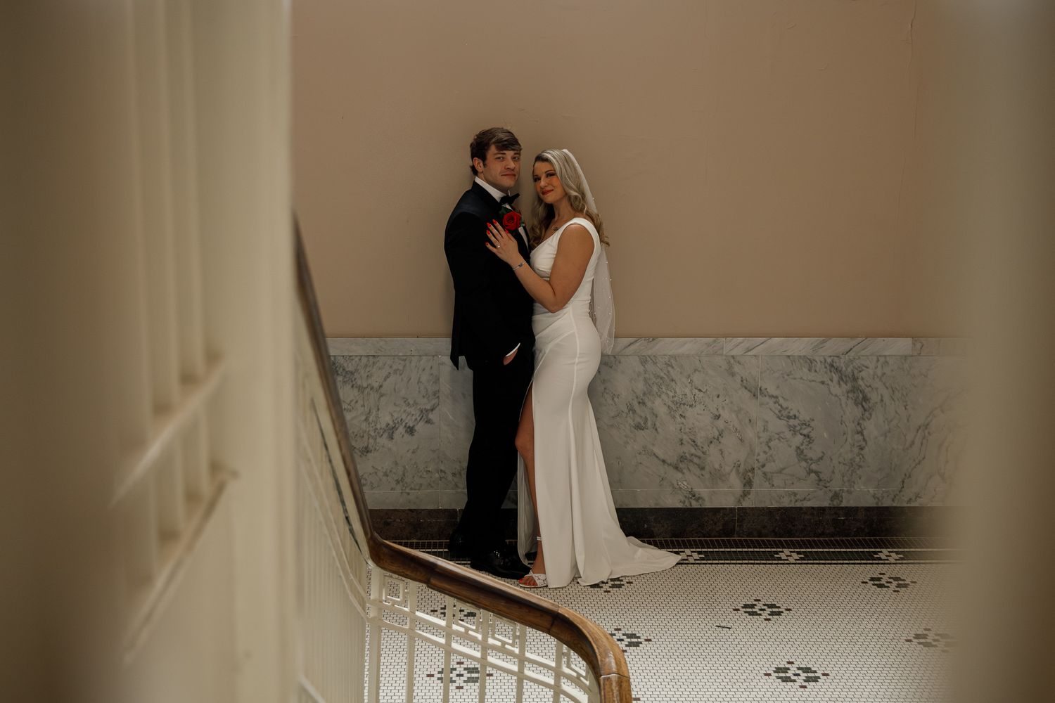 A romantic sequence of sepia-toned photos showing a couple dancing and embracing in an elegant interior setting.