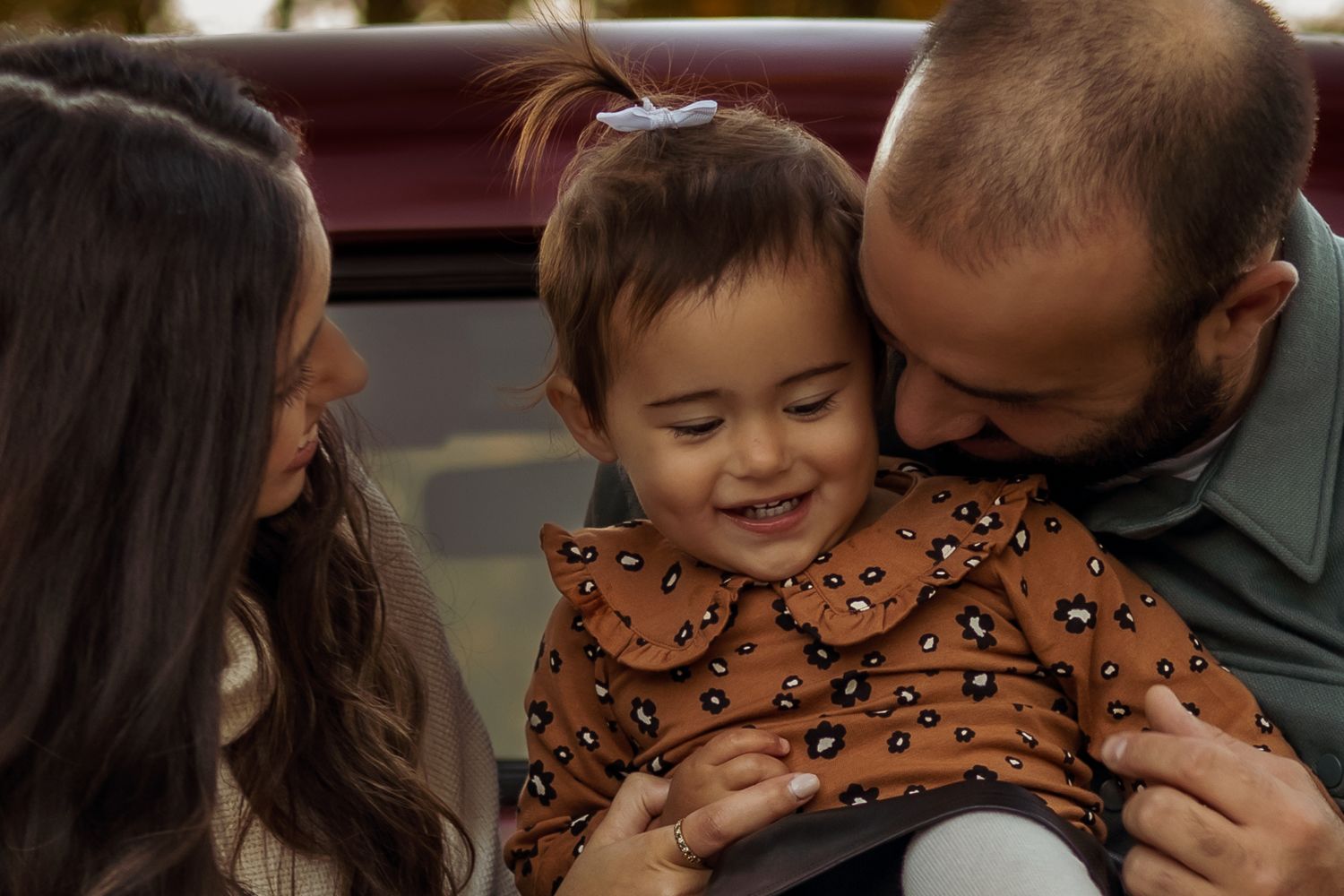 A series of candid moments showing a parent and child sharing tender embraces and playful interactions.