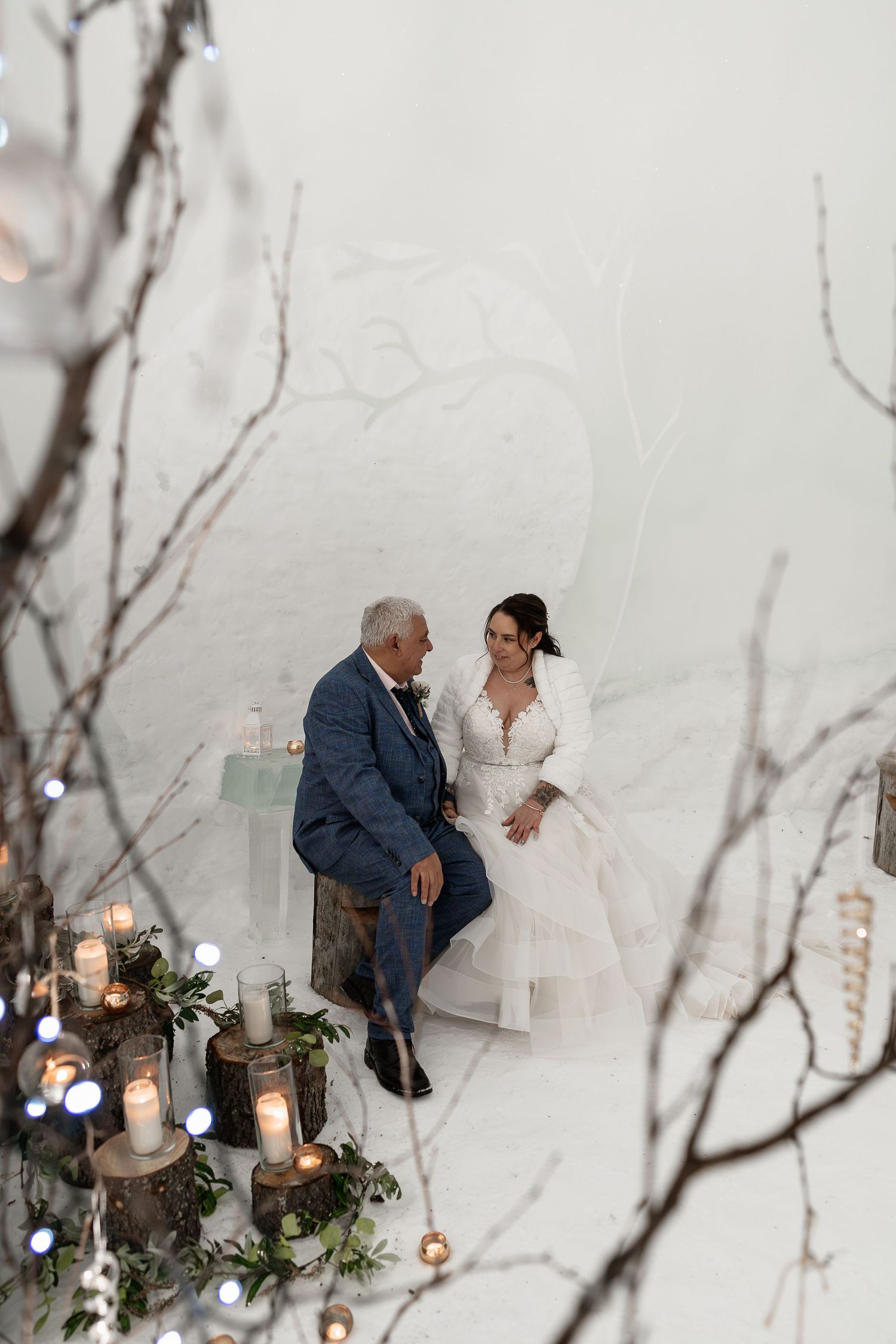Candlelit wedding vows ceremony-luxury wedding at Snow Chapel, Northern Lights Village, Levi. Lapland Wedding Photographer. Love in Lapland
