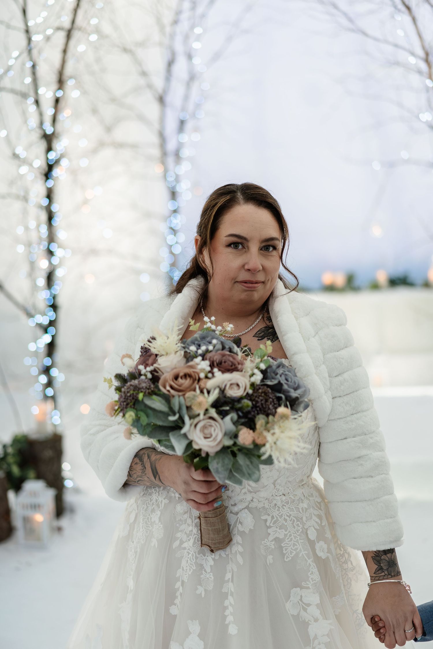 Bride Sammi at wedding ceremony-luxury wedding at Snow Chapel, Northern Lights Village, Levi. Lapland Wedding Photographer. Love in Lapland
