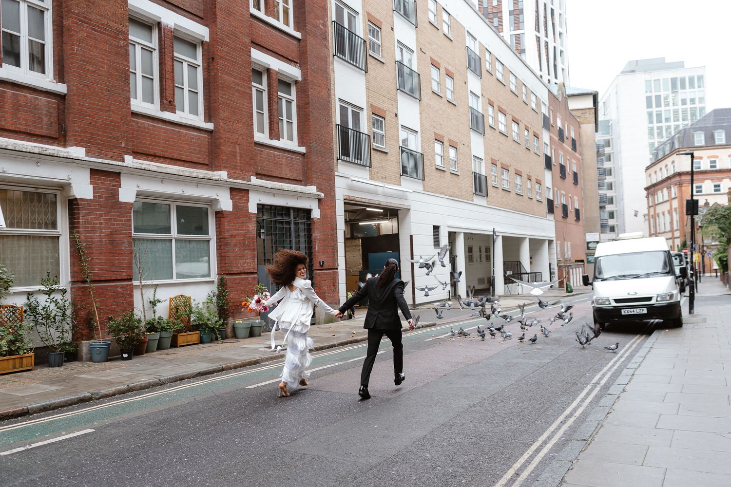 Relaxed wedding couple at The Hoxton, Holborn. London Wedding Photographer.