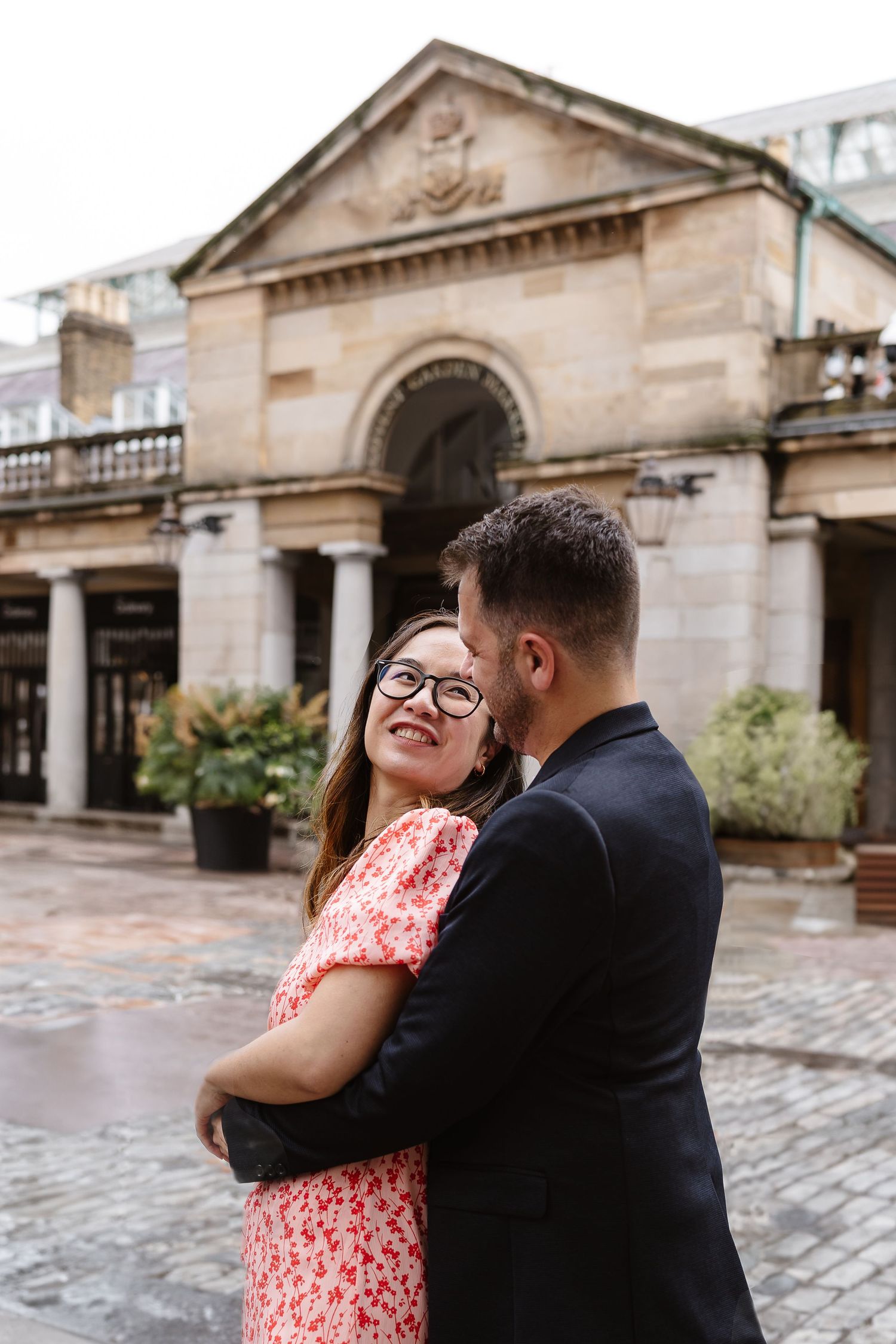 Alitha & James in Londons iconic covent garden in Spring for their exciting Engagement / Pre-Wedding photoshoot engagement ring