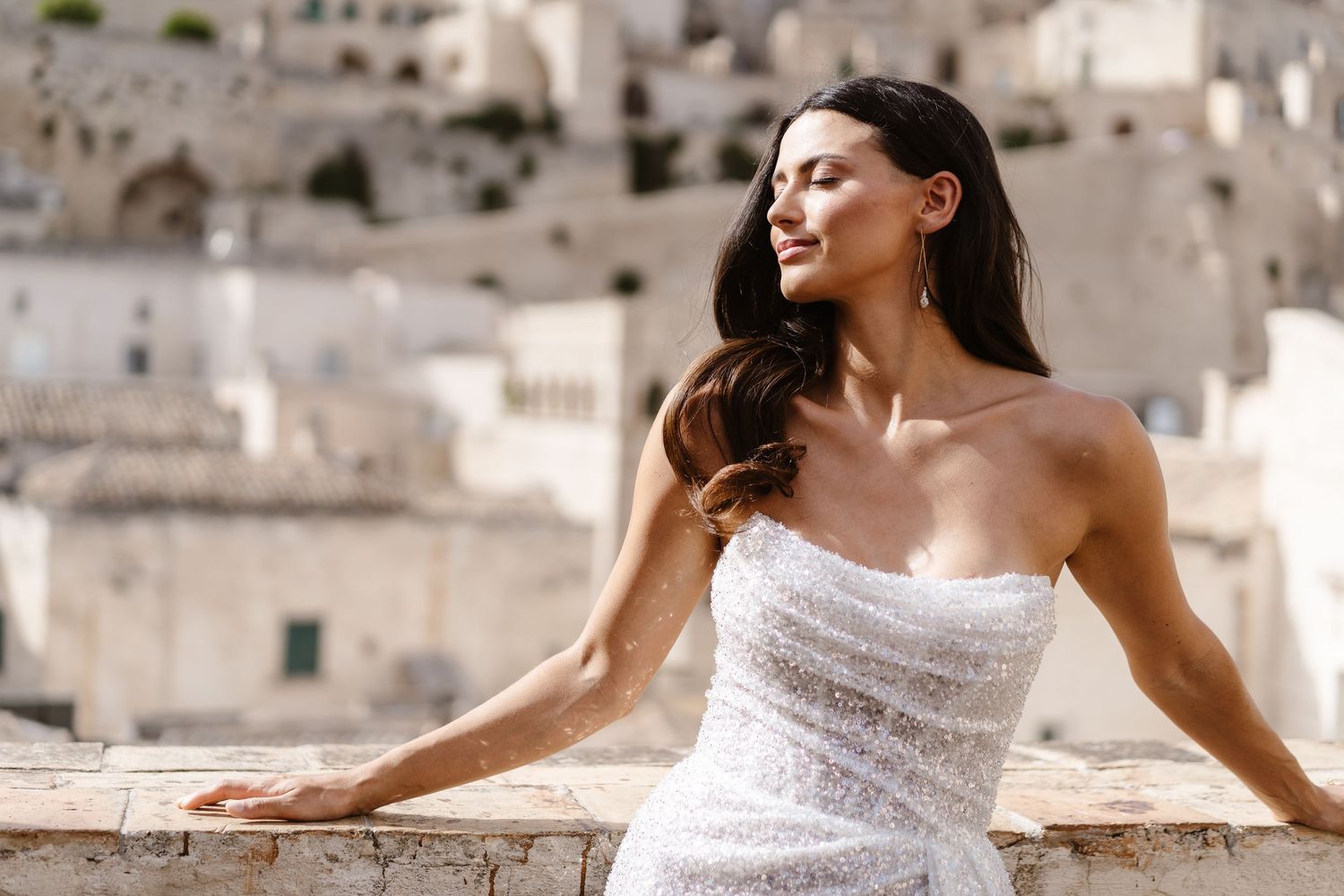 A bold / sassy statement highlighting the strapless Milla Nova Wedding dress