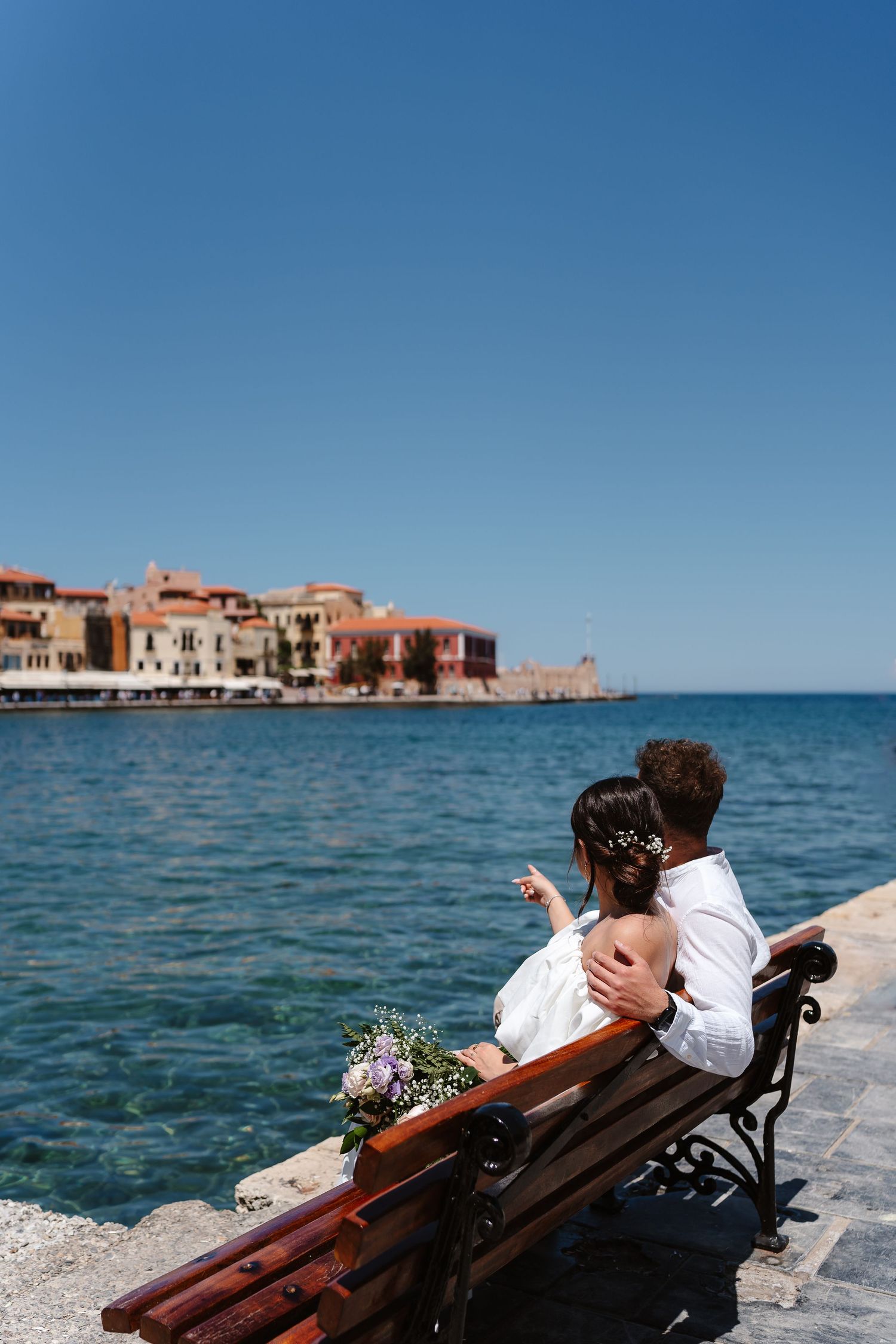Bride & Groom at Old Venetian Harbour in Chania, Crete by Greece Wedding Photographer
