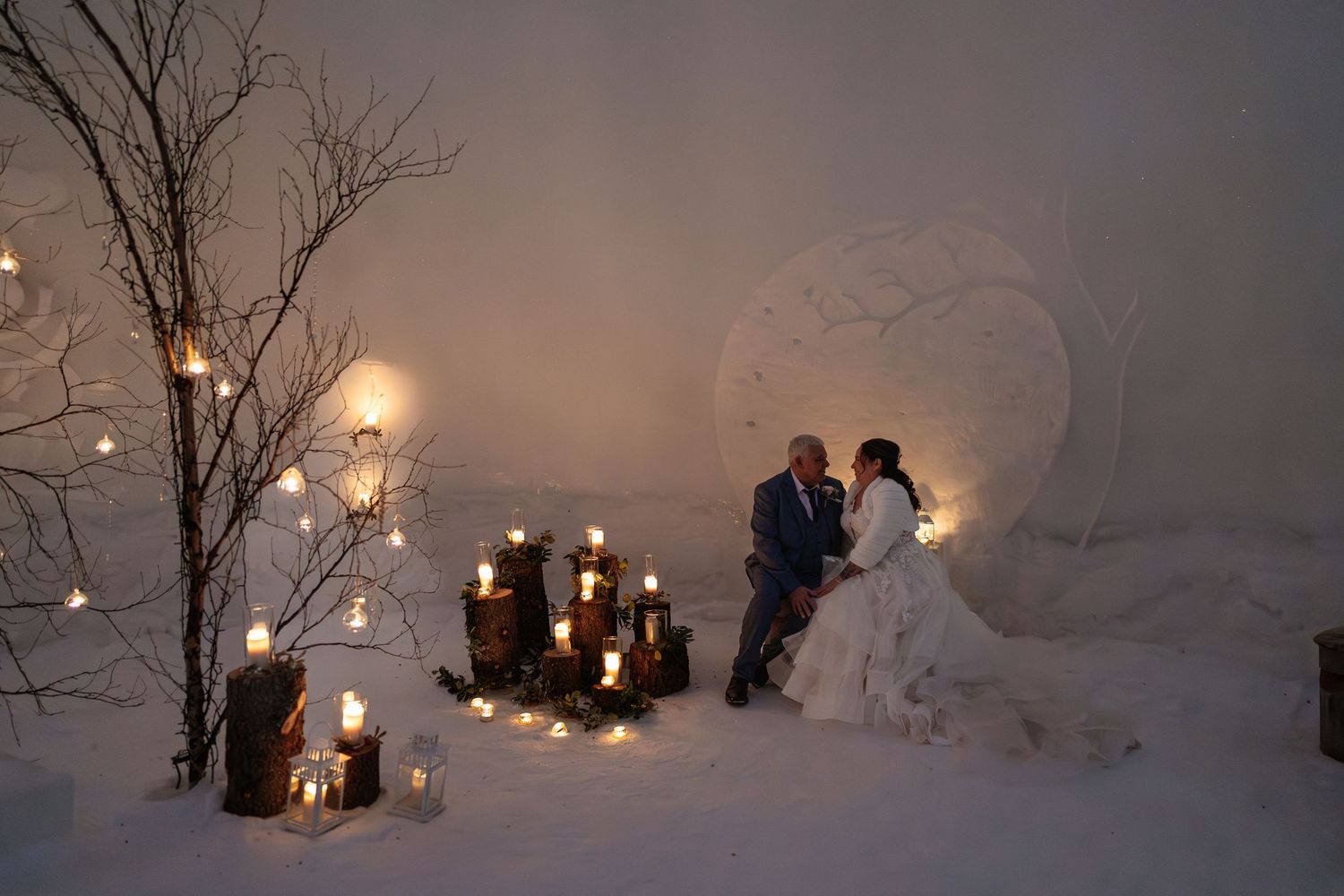 Snow Chapel wedding photos in Lapland, Levi. Luxury Lapland wedding photographer. Snow wedding. Candlelit Wedding. Igloo wedding