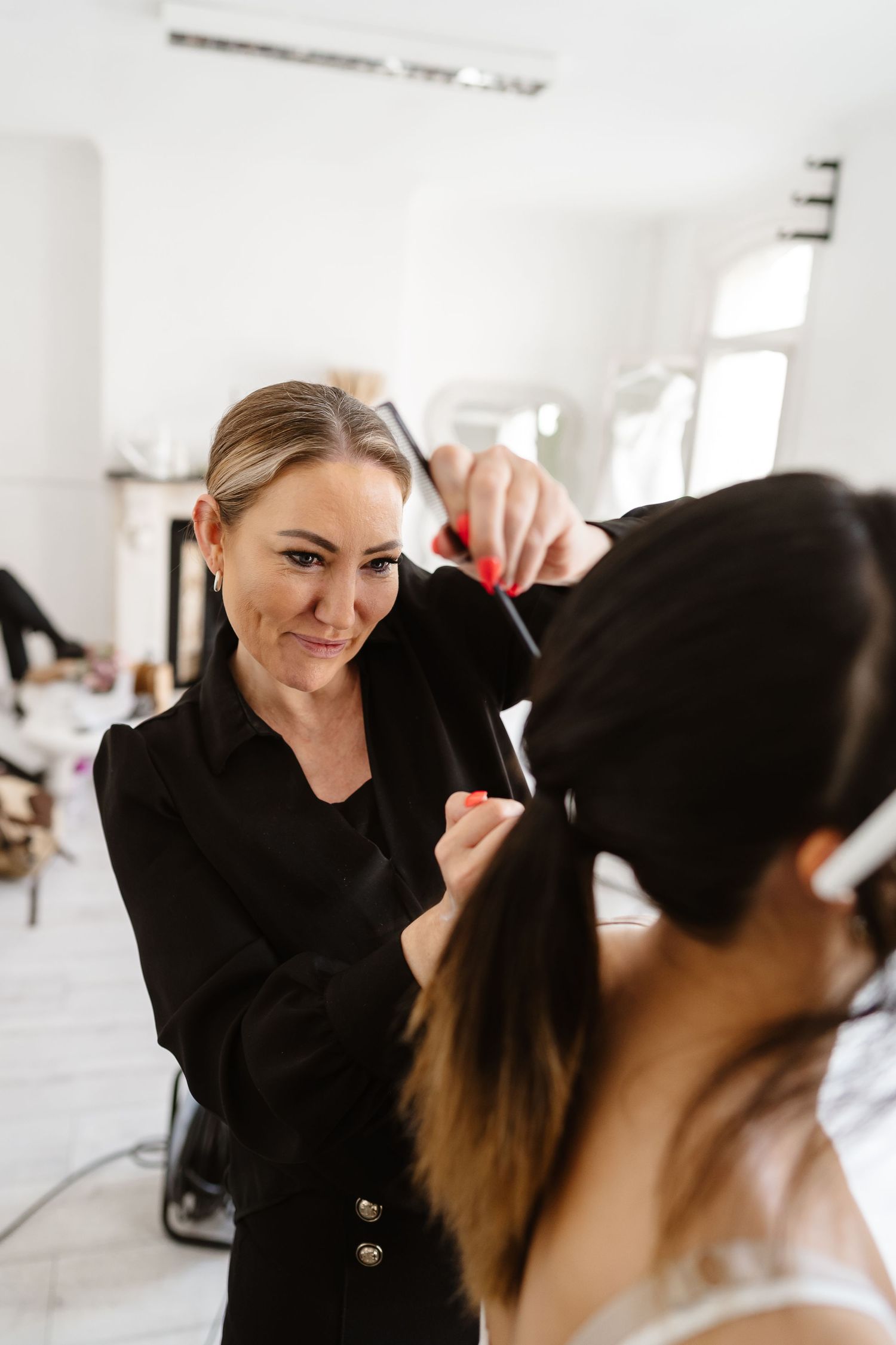 Make up artist and Hair stylist during bridal prep in London St Paul's for Wedding bridal hair and make up. London Weddi
