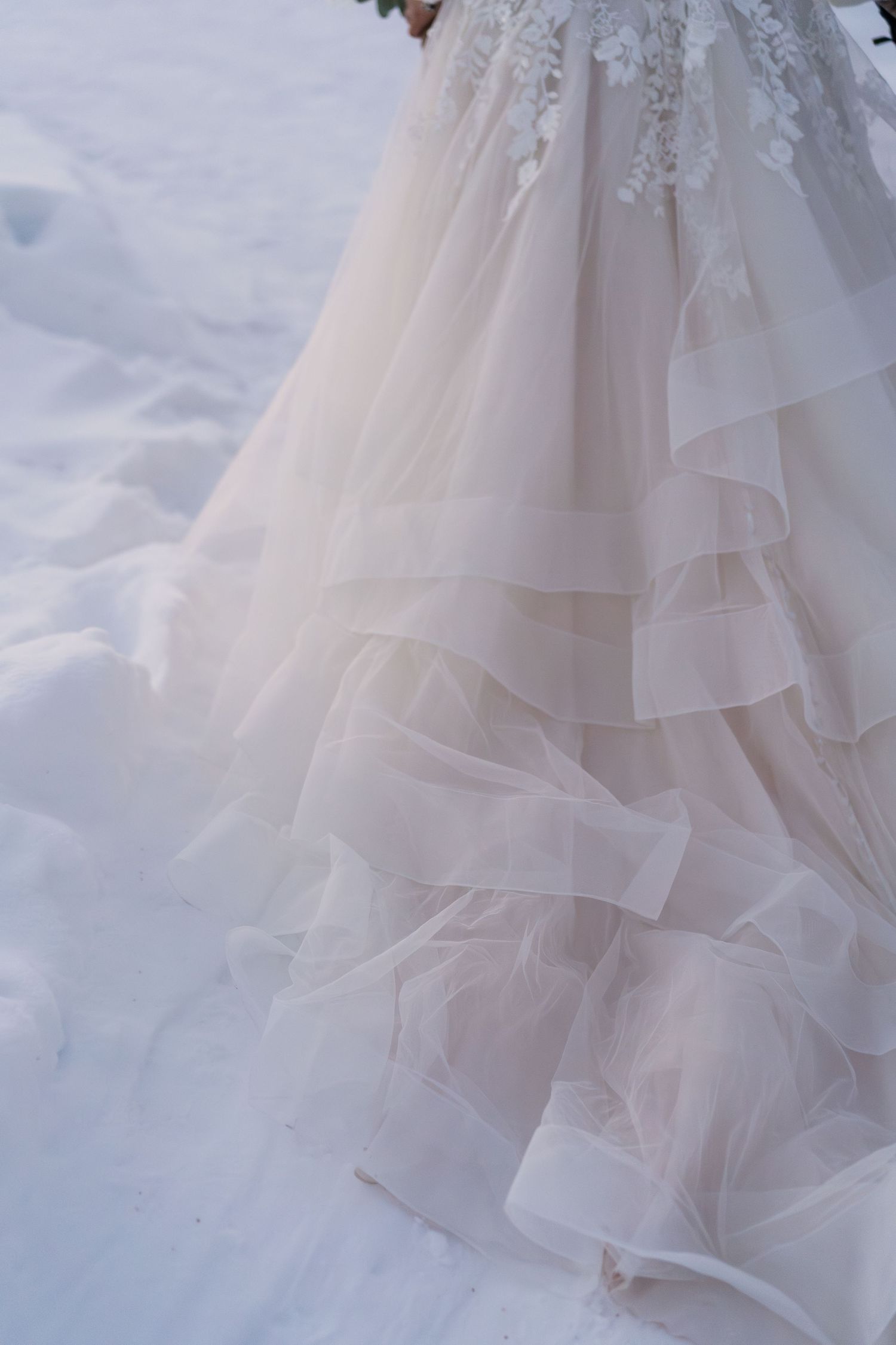 Princess wedding dress at Snow Chapel, Levi. Luxury Lapland wedding photographer. Snow wedding. Mountain Wedding.
