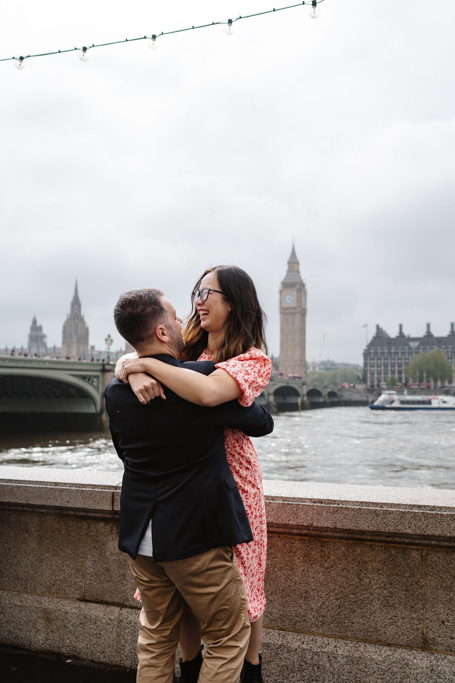 Alitha & James in Londons iconic big ben westminster in Spring for their exciting Engagement / Pre-Wedding photoshoot engagement ring