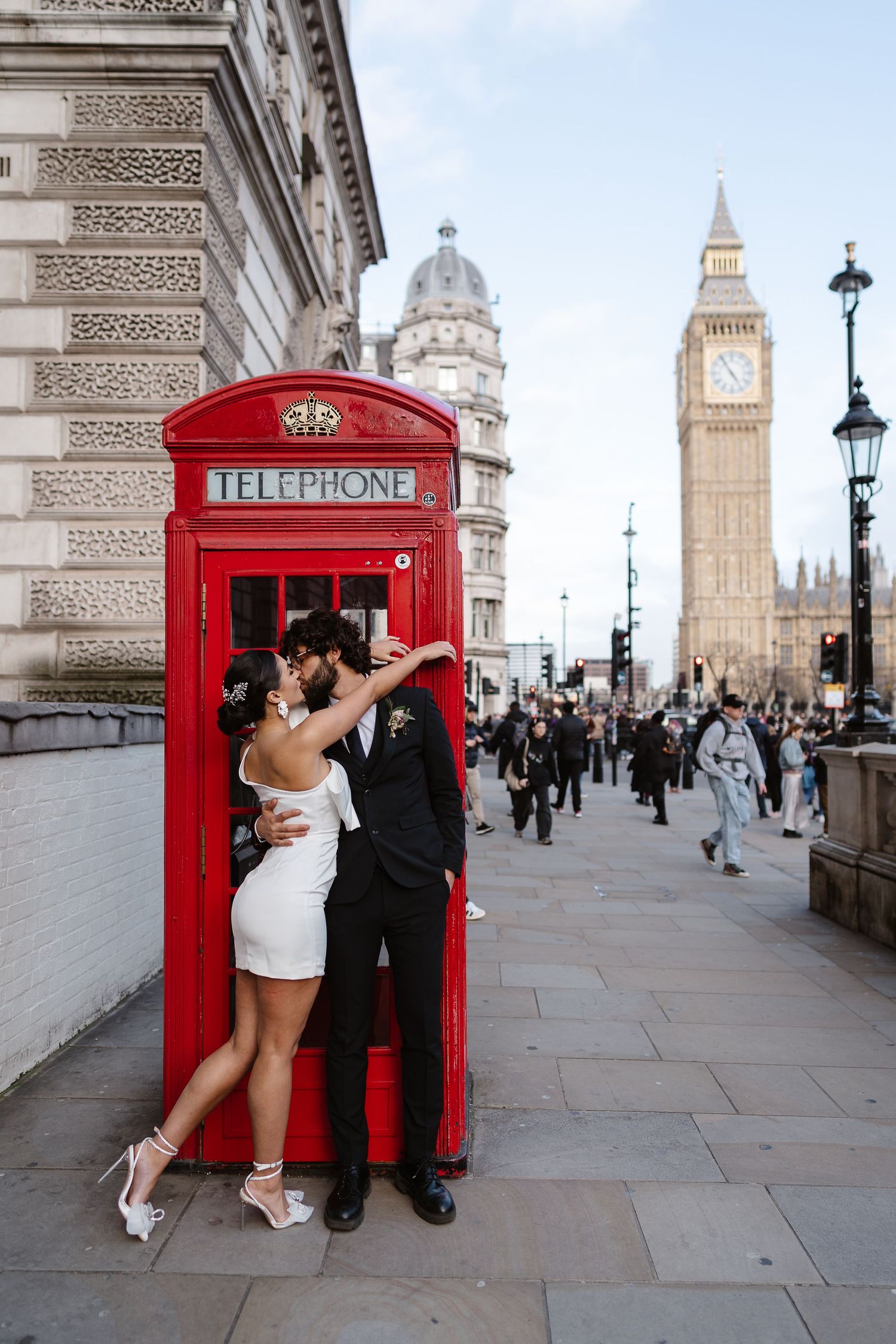 Relaxed, Natural wedding photos. Red Phone Box. Big Ben & Westminster River Thames. London Wedding photographer