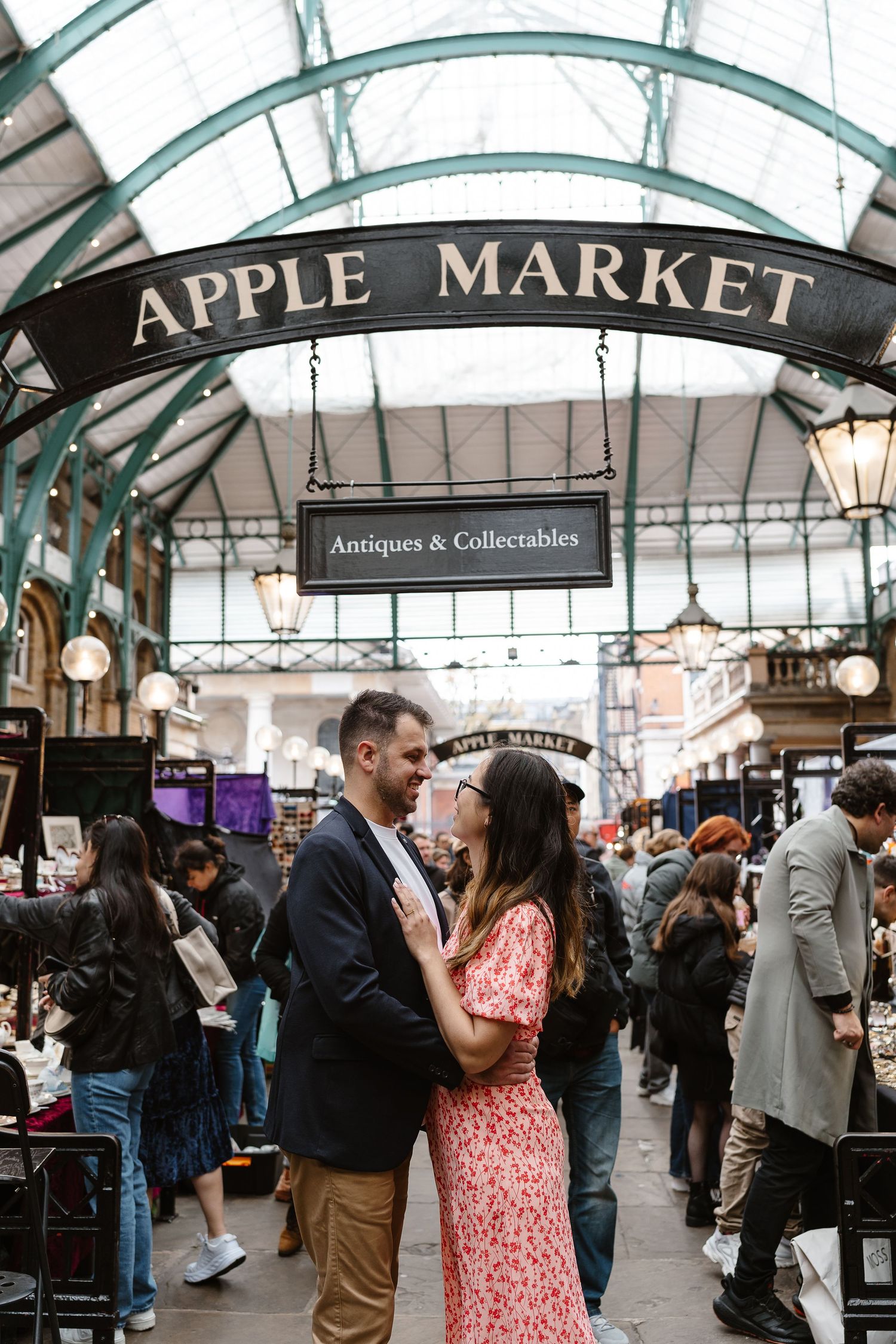 Alitha & James in Londons iconic covent garden in Spring for their exciting Engagement / Pre-Wedding photoshoot engagement ring