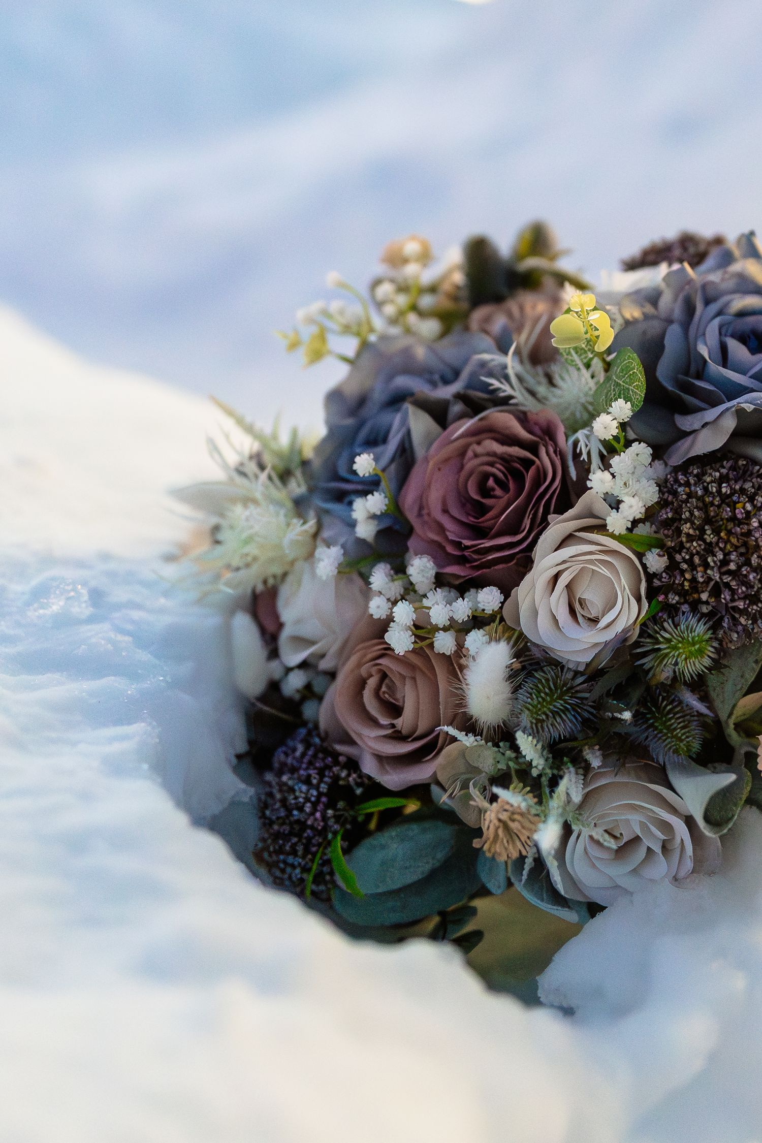 Pink flowers and twilight for luxury wedding at Snow Chapel, Northern Lights Village, Levi. Lapland Wedding Photographer. Love in Lapland