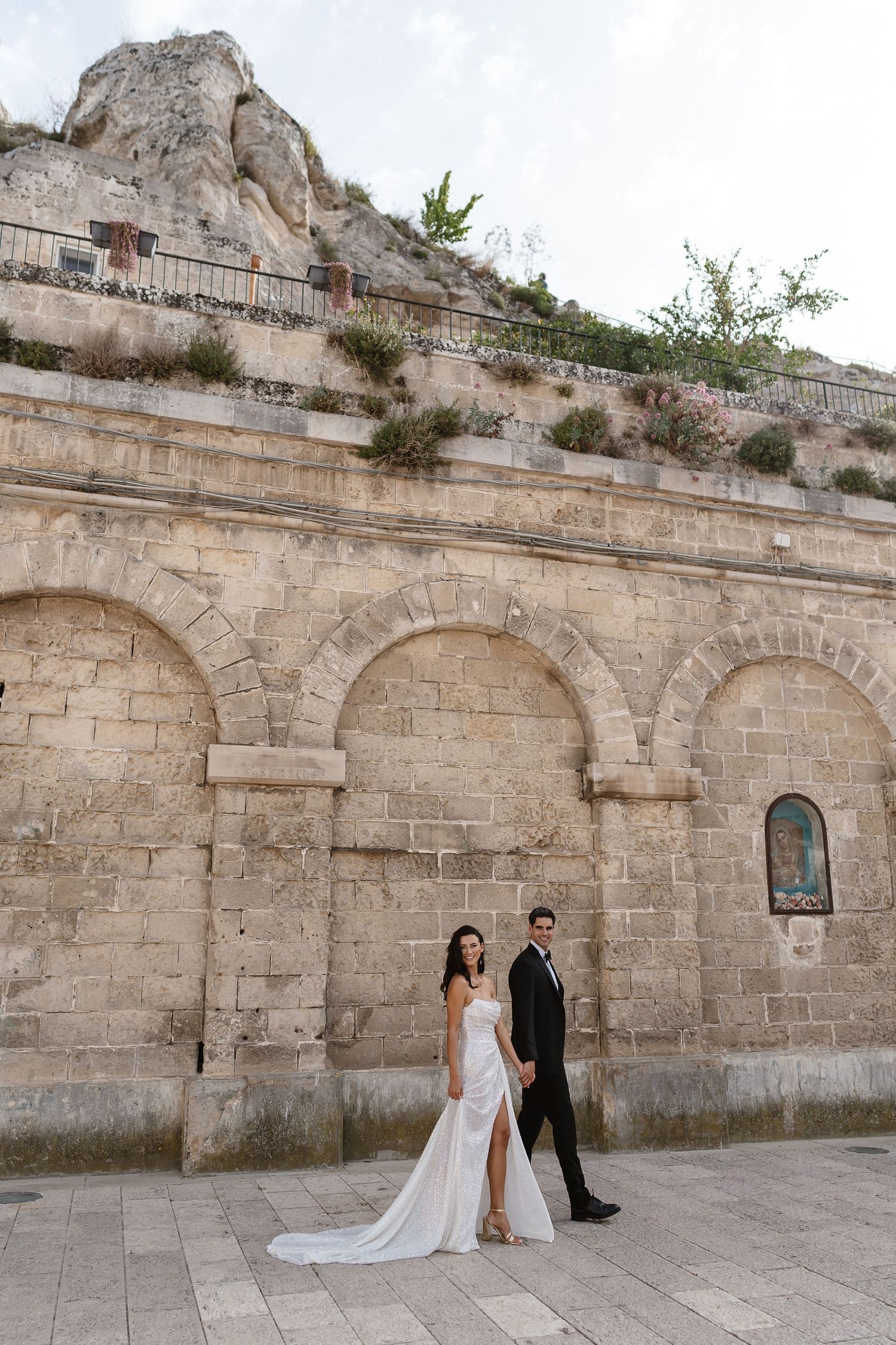 Casual walk, holding hands, carefree and relaxed. though the old town