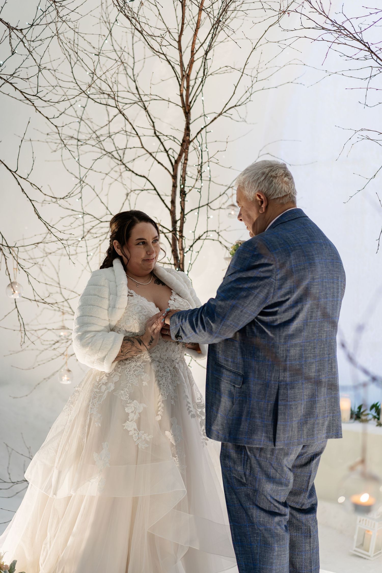 Candlelit wedding vows ceremony-luxury wedding at Snow Chapel, Northern Lights Village, Levi. Lapland Wedding Photographer. Love in Lapland