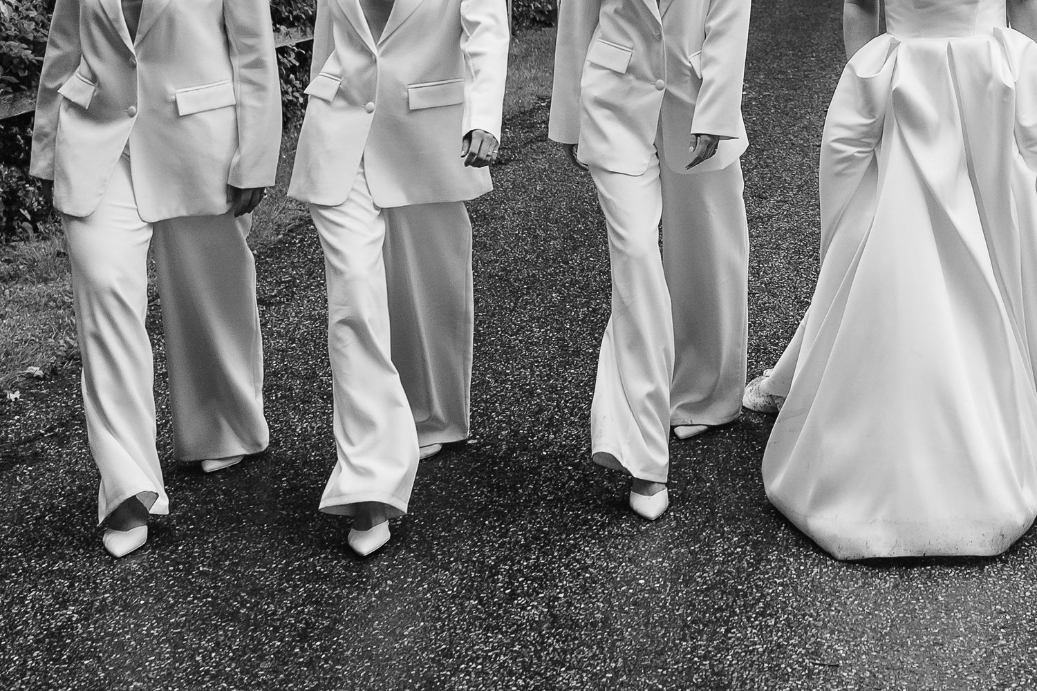 Floaty swish of the Vera Wang dress and the bridesmaid suits in Norfolk