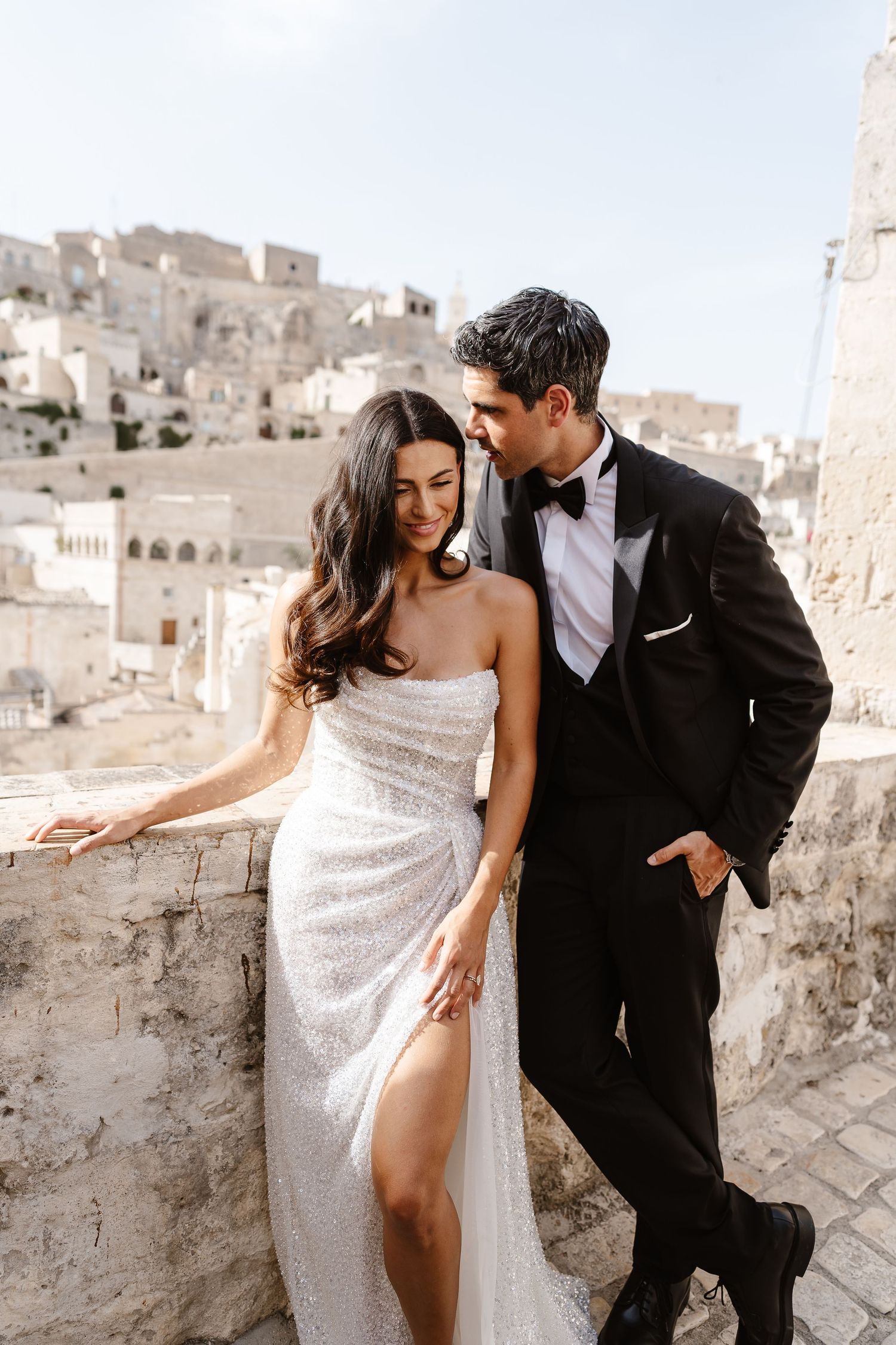 Casual/relaxed stance stylish tux compliments Milla Nova dress. destination photographer
