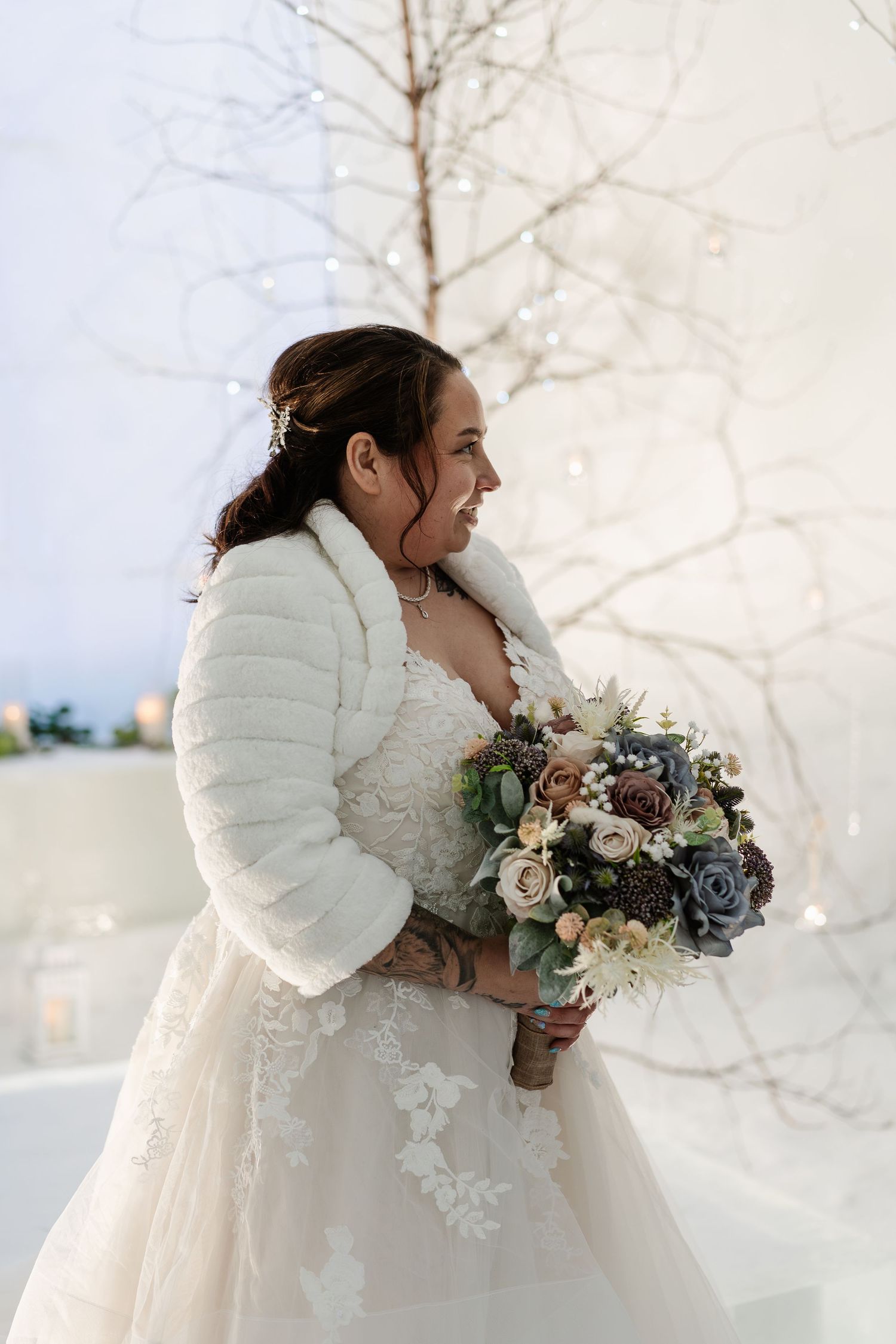 Bride Sammi at wedding ceremony-luxury wedding at Snow Chapel, Northern Lights Village, Levi. Lapland Wedding Photographer. Love in Lapland