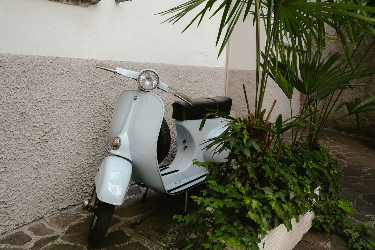 Groom and Vespa Lake Como. Villa Guilia Wedding Venue. Lake Como Wedding Photographer. Destination Wedding Photographer