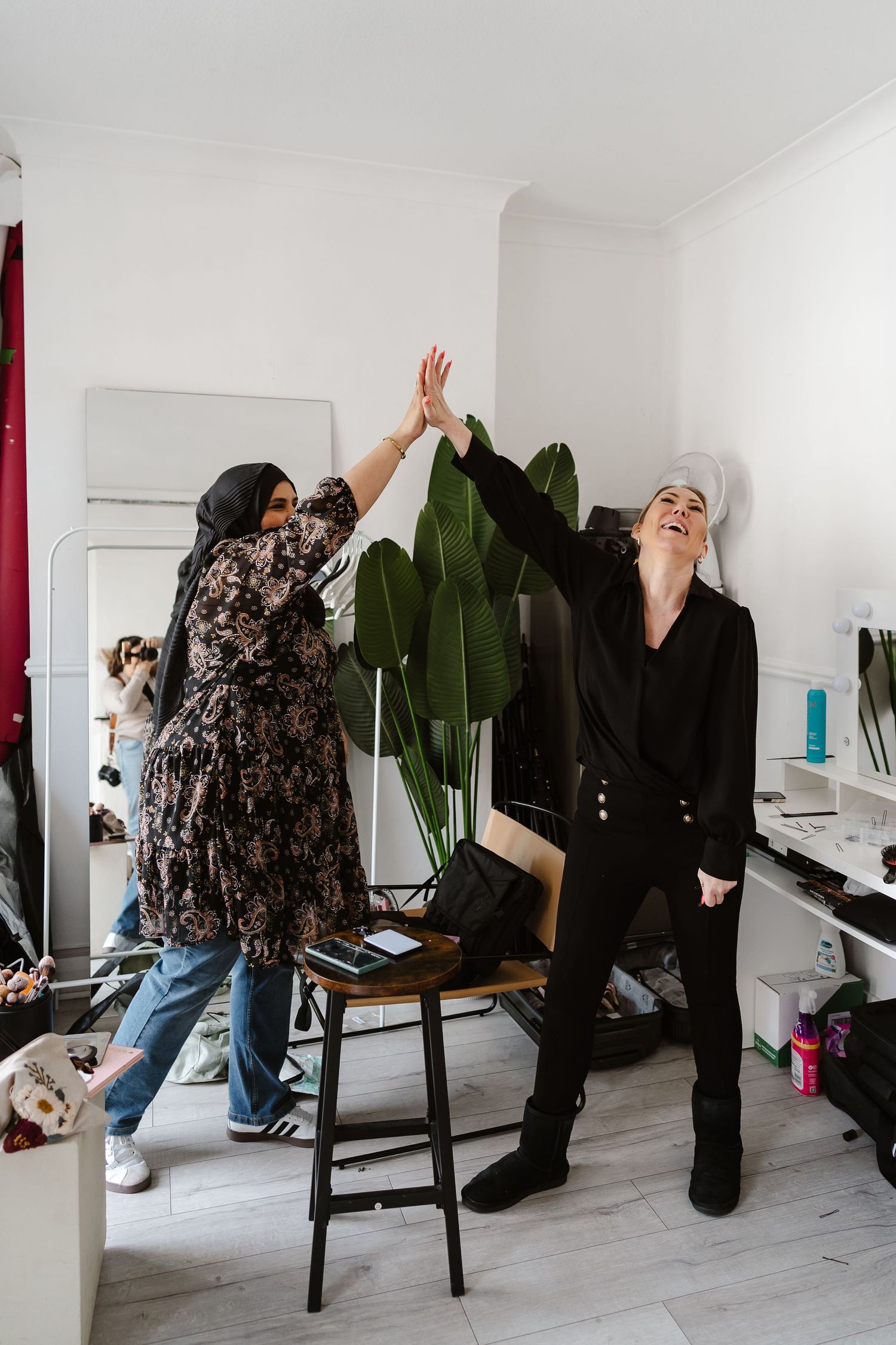 Make up artist and Hair stylist during bridal prep in London St Paul's for Wedding bridal hair and make up. London Weddi
