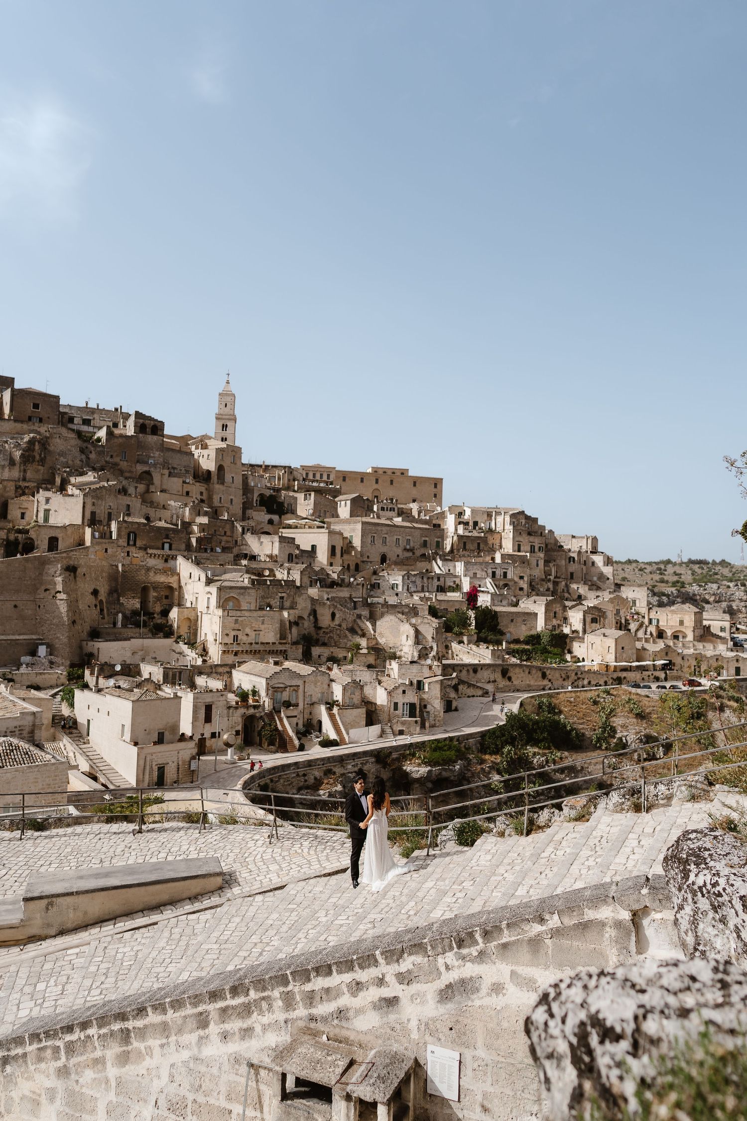 standing on the steps of the world heritage site - Matera  Italy