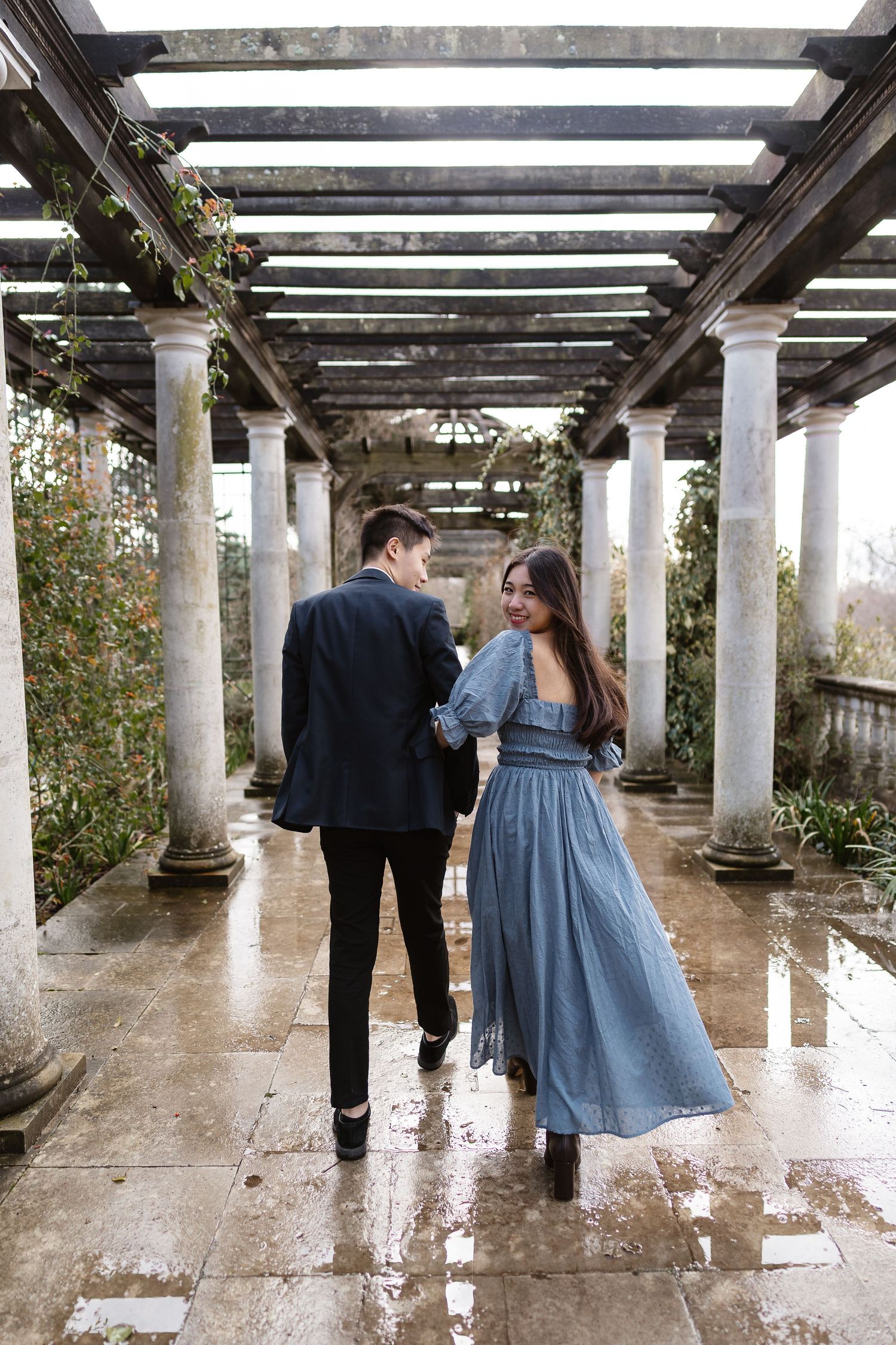 Blue floatie backless casual dress happy over the shoulder smile, London photographer