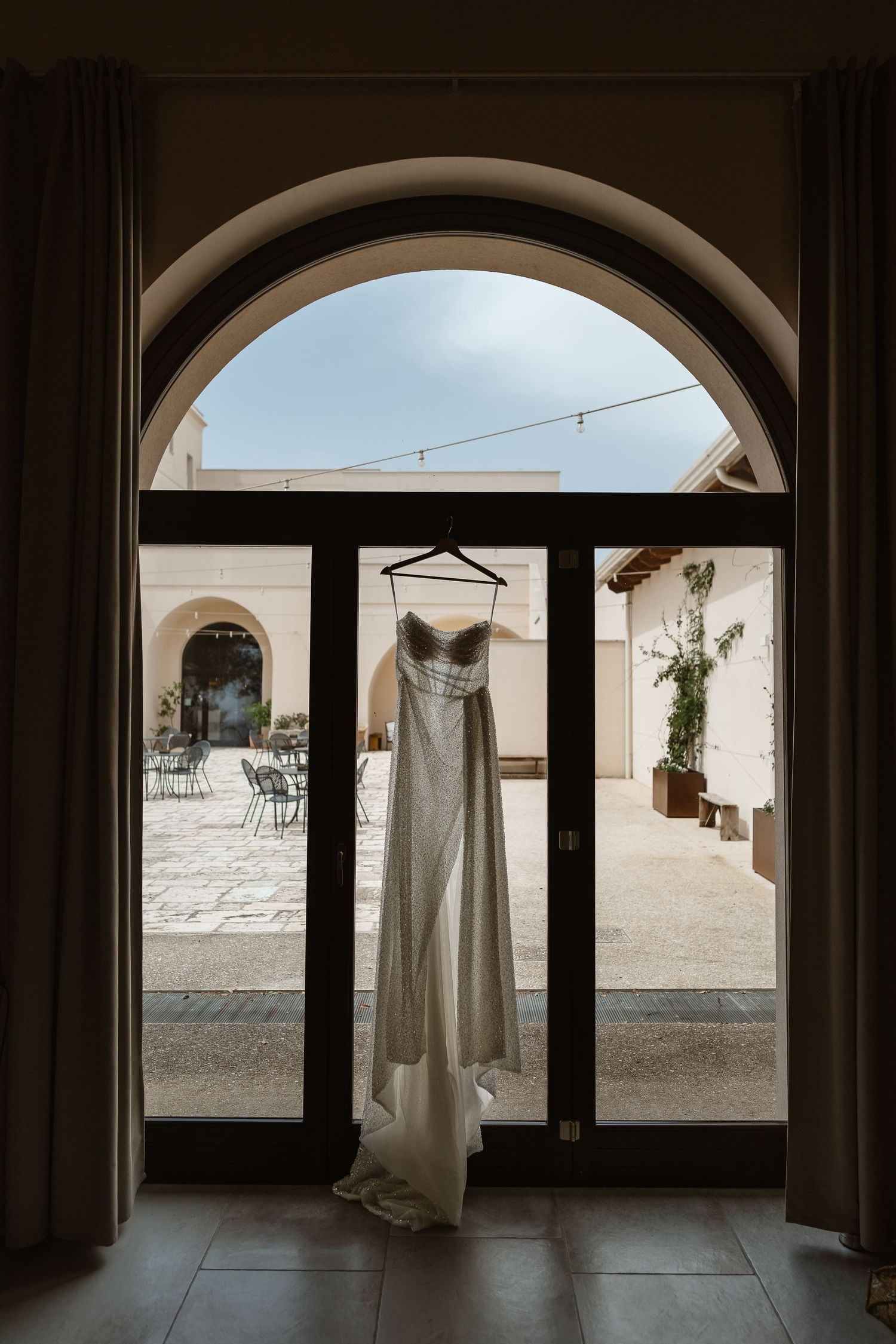 Bridal prep at Masseria Fontana Divite with stylish Milla Nova wedding dress from The Wedding Shop Colchester. Italy