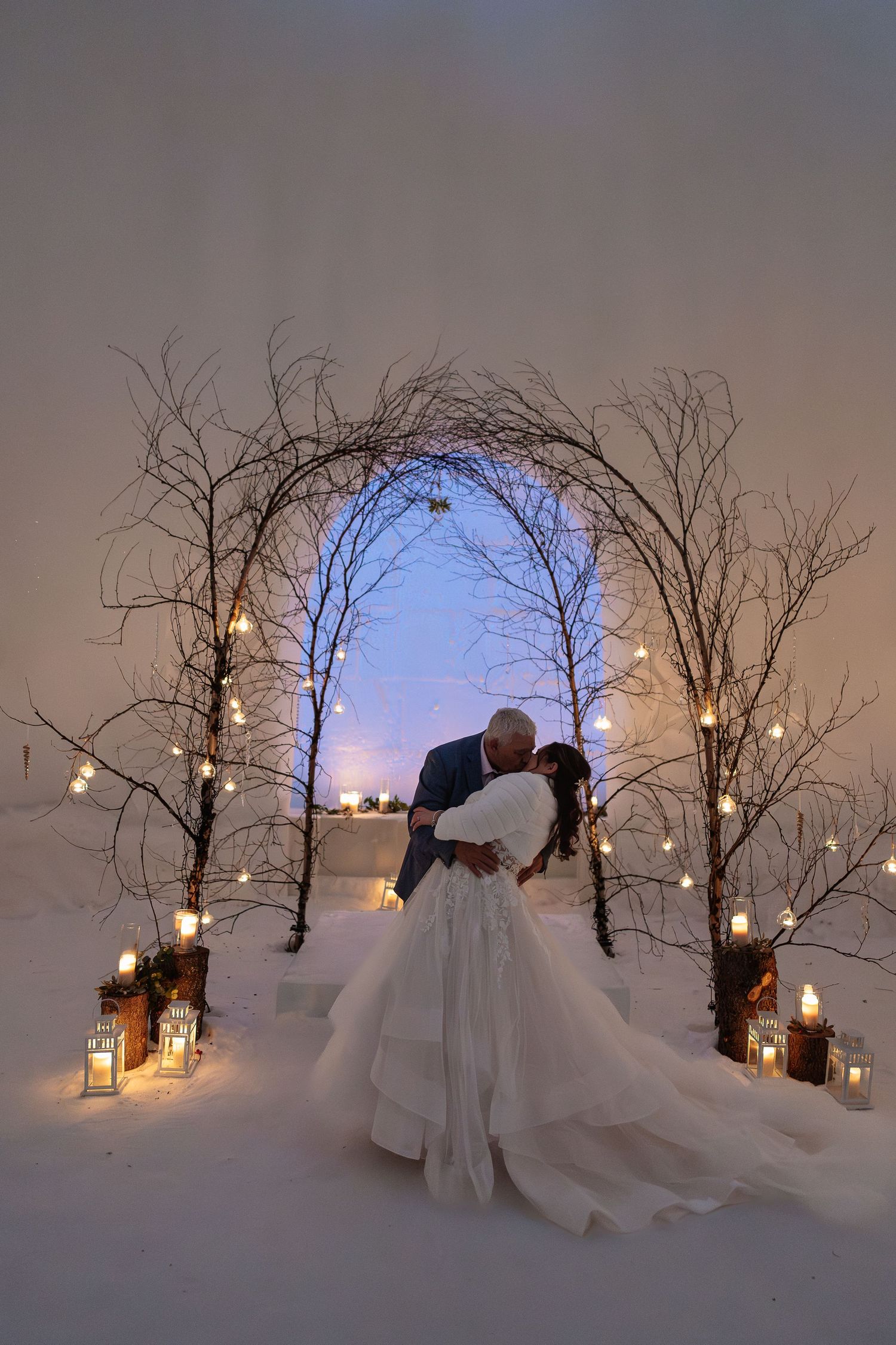 Romantic couple marry at Snow Chapel, Levi. Luxury Lapland wedding photographer. Snow wedding. Mountain Wedding. Northern Lights Ranch elope