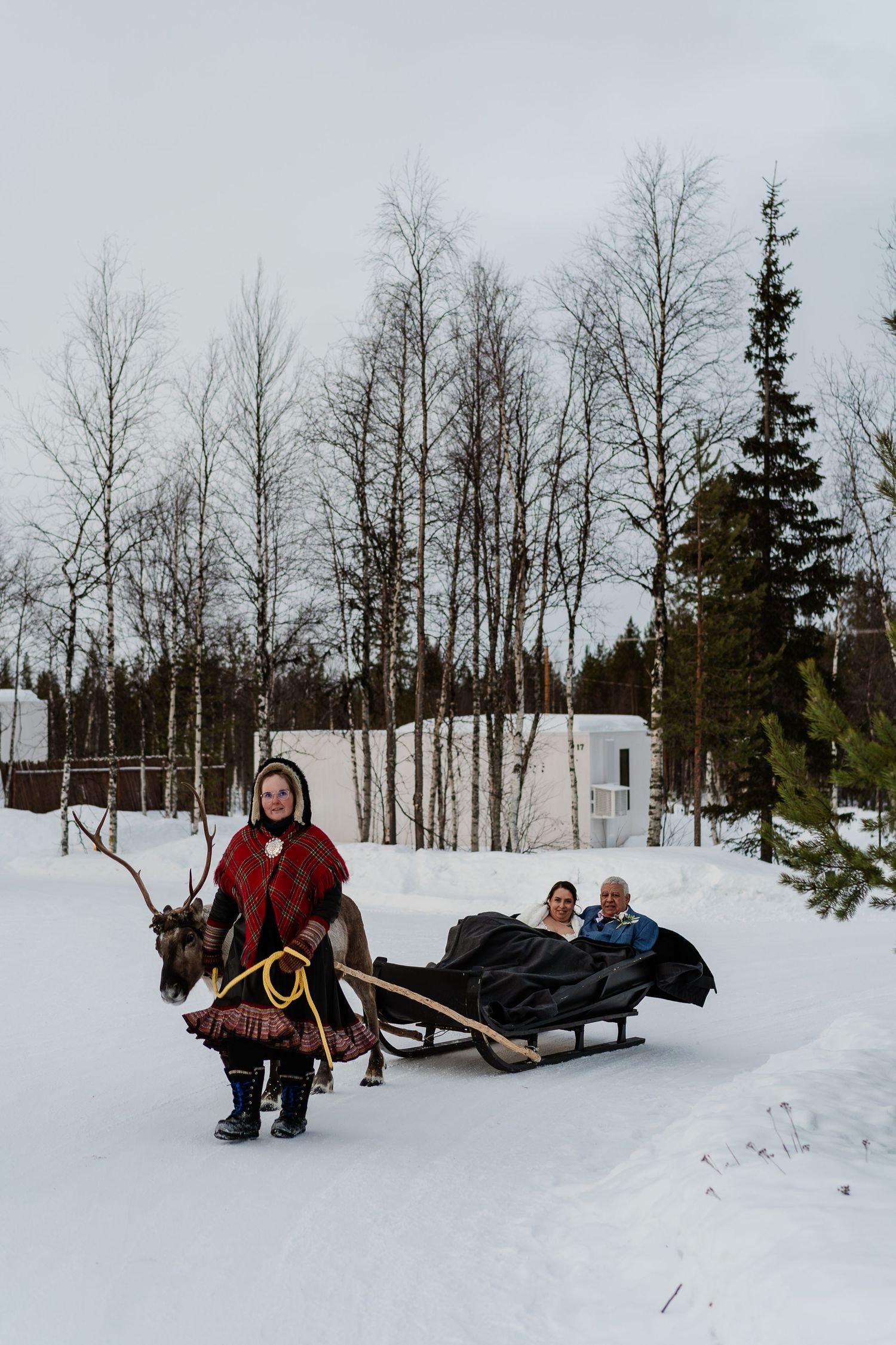 Reindeer sleigh ride on wedding day in Lapland. Eloping in Lapland. Marry in Lapland. Unique Wedding Experience in Lapland. Photography