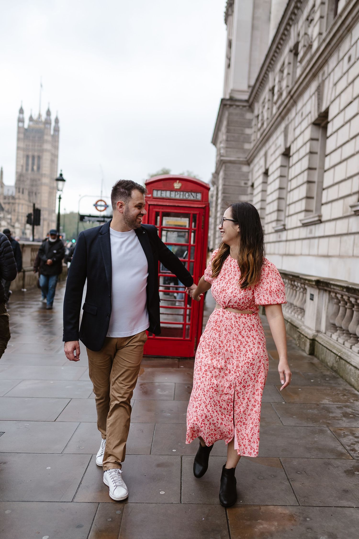 The rain didn't dampen this couple relaxed engagement walk through the streets of London for their engagement photos
