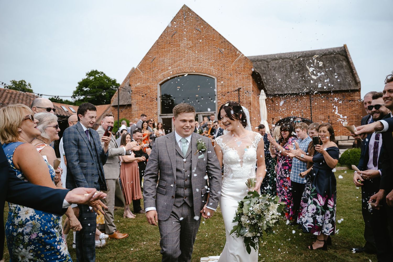 Couple and their Confetti at Southwood Hall, Barn Wedding Venue, Norfolk Wedding Venue