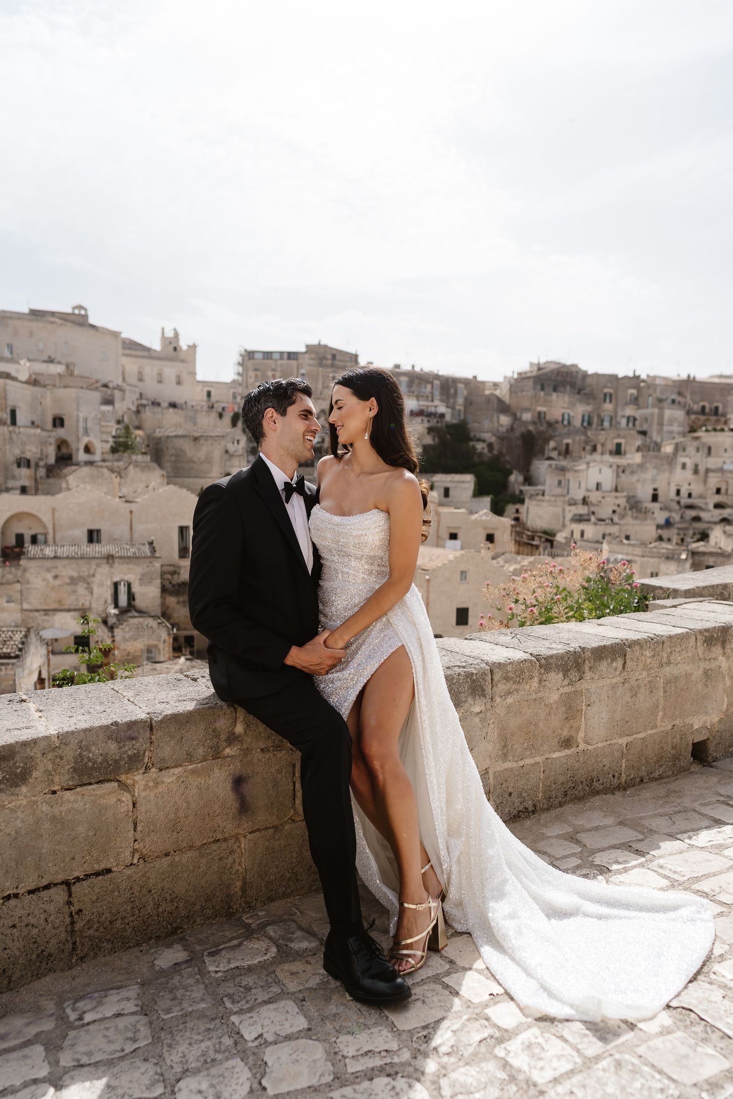 Embracing the full side split on the exquisite Wedding dress. flirty vibe romantic gaze