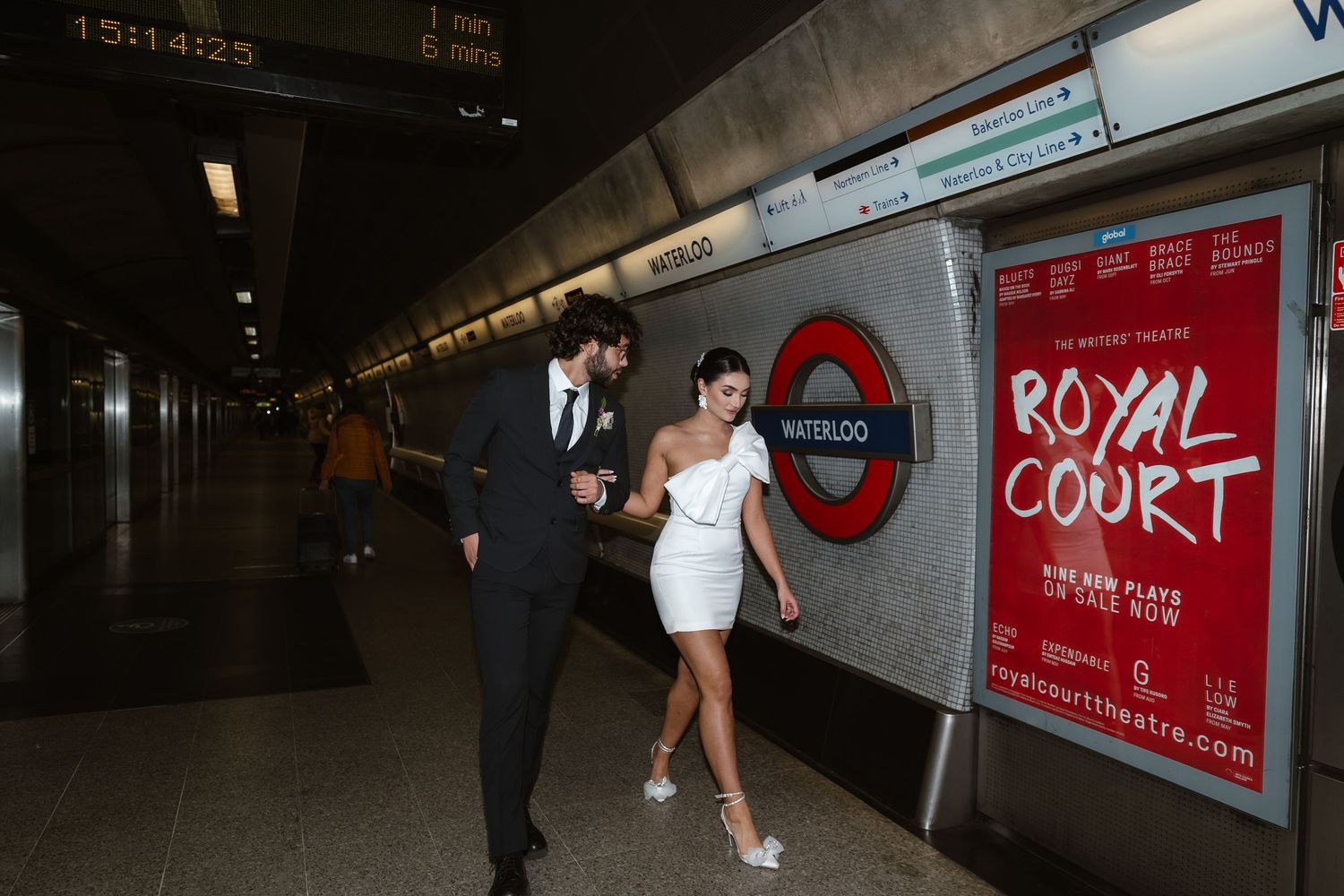 bride and groom in the London Underground Tube, direct flash editorial photography. Modern fun wedding photos. London