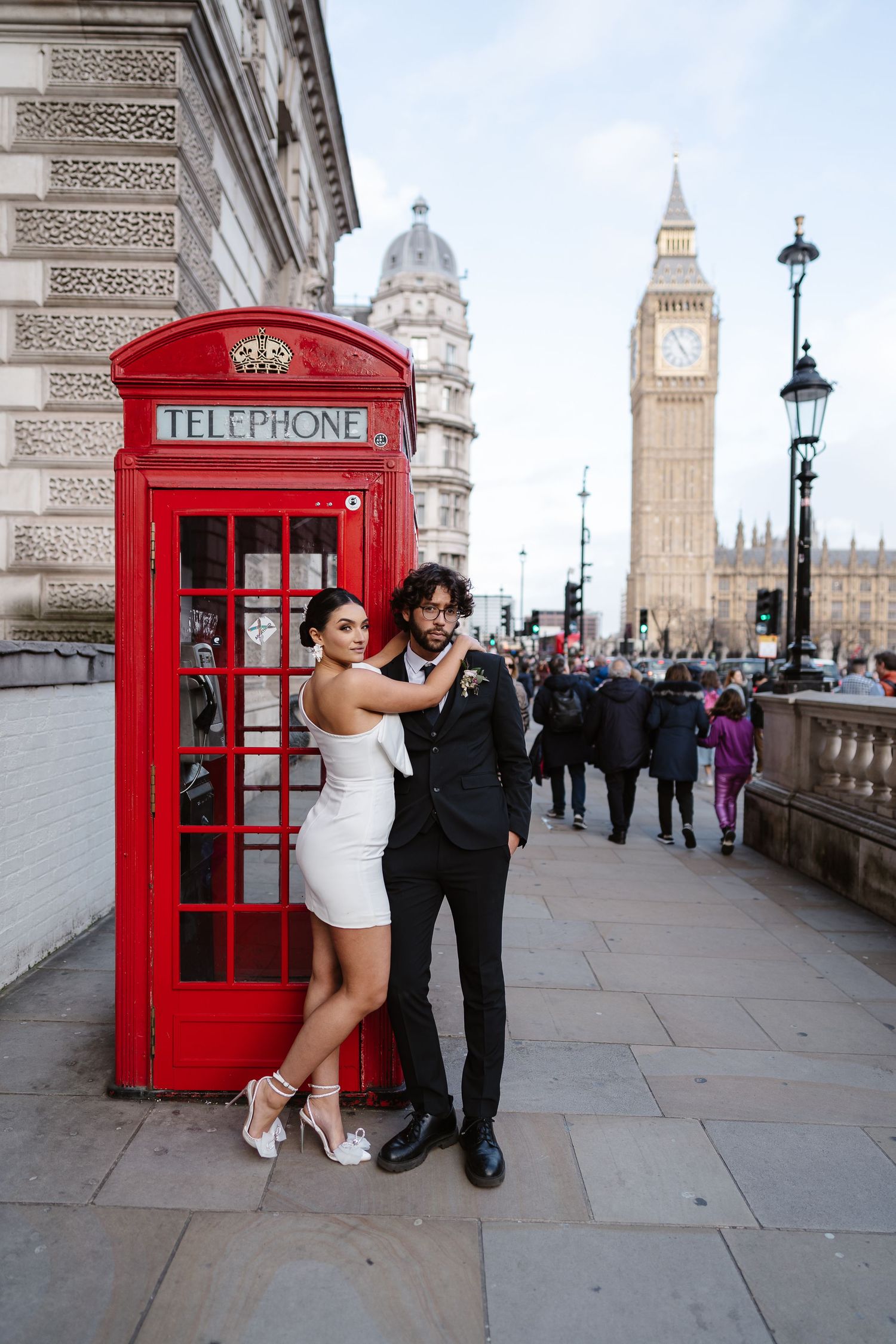 Relaxed, Natural wedding photos. Red Phone Box. Big Ben & Westminster River Thames. London Wedding photographer