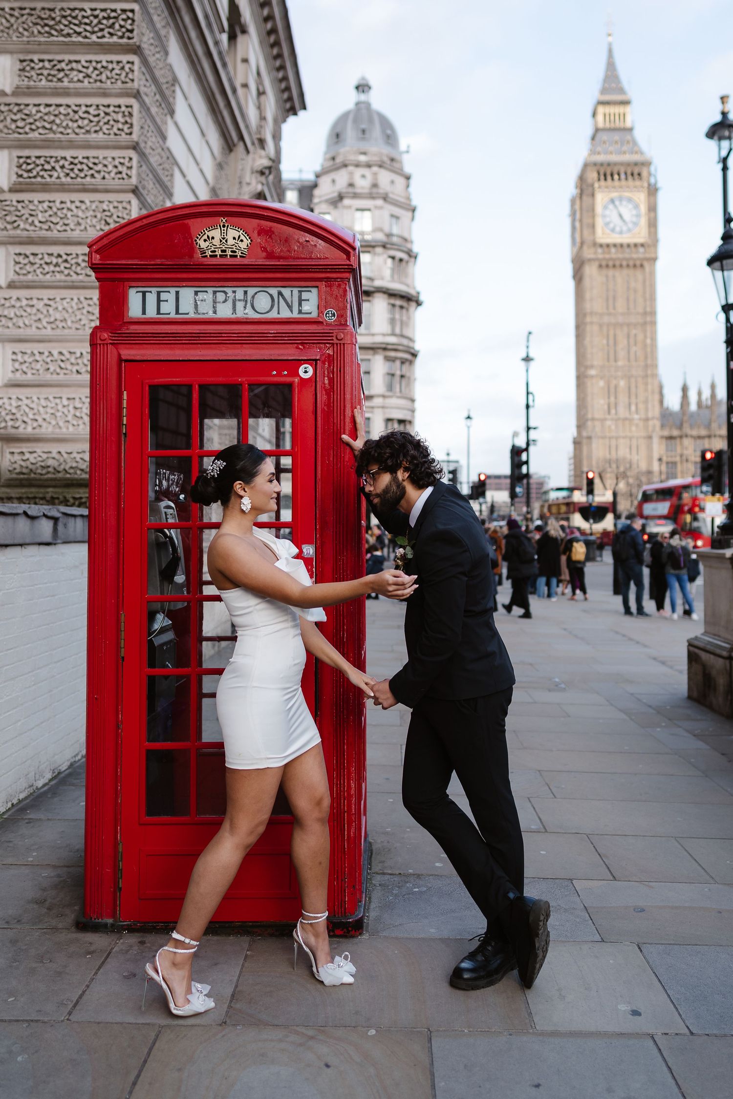 Relaxed, Natural wedding photos. Red Phone Box. Big Ben & Westminster River Thames. London Wedding photographer