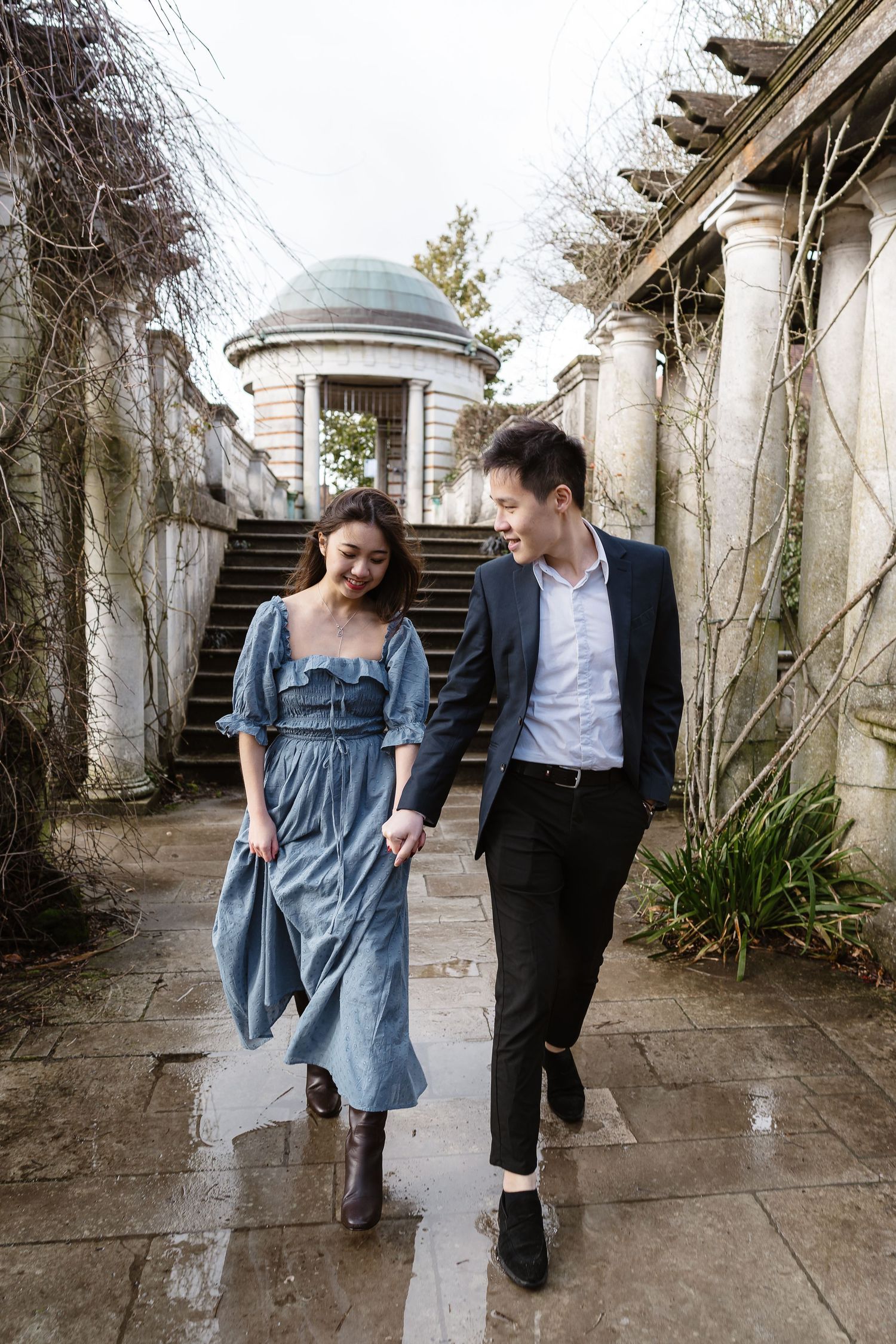 A relaxing stroll and chat through the puddles Hampstead Heath London engagement photographer