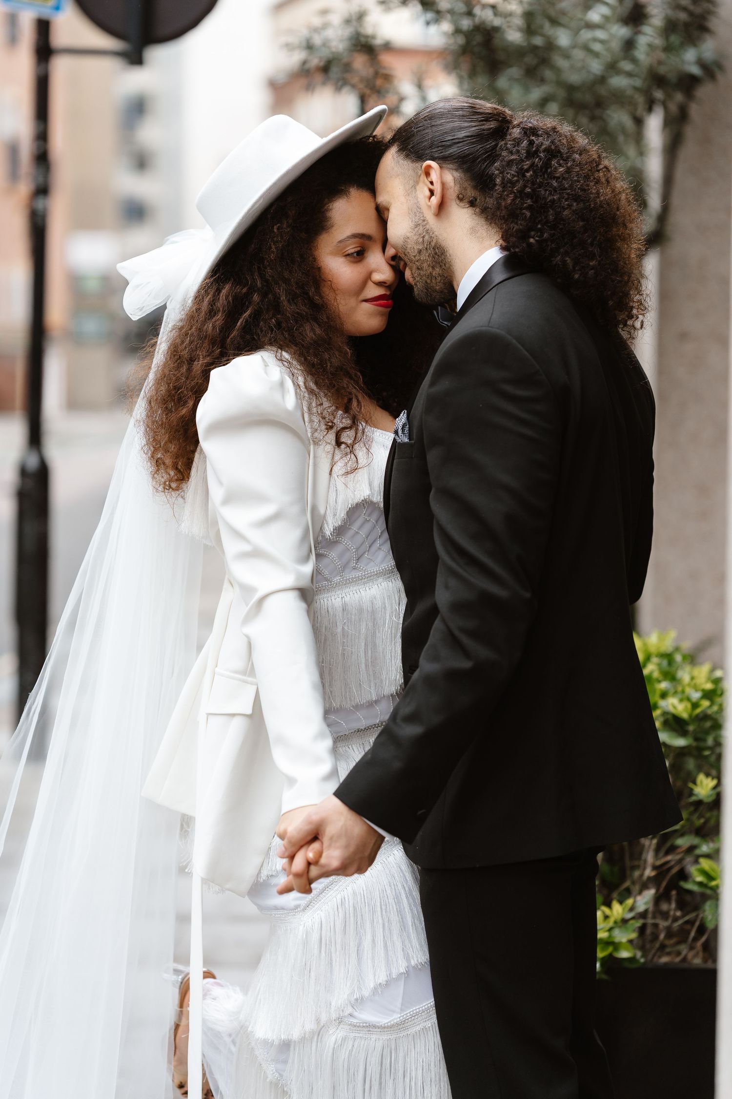 Relaxed wedding mixed race couple at The Hoxton, Holborn. London Wedding Photographer.