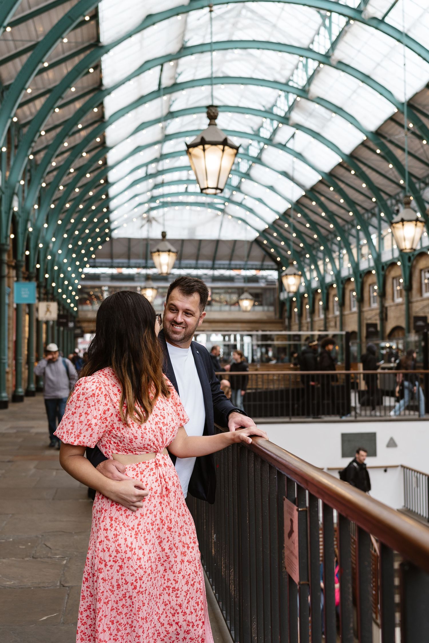 Alitha & James in Londons iconic covent garden in Spring for their exciting Engagement / Pre-Wedding photoshoot engagement ring