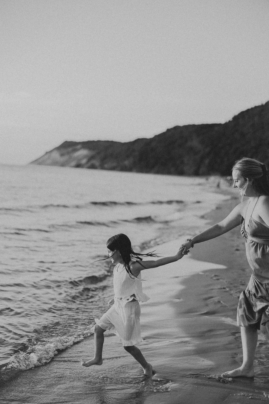 candid family photos at esch beach near the sleeping bear national lakeshore in Northern michigan