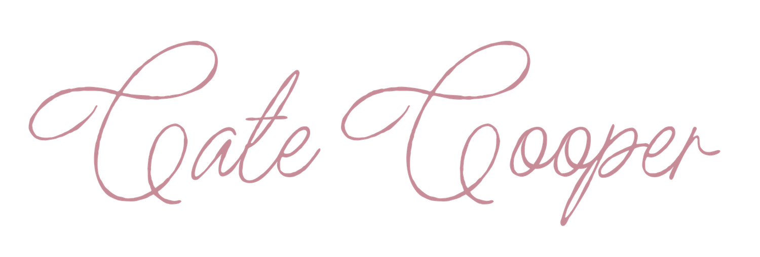 Elegant pink cursive script signature logo reading Cate Cooper photographer branding.