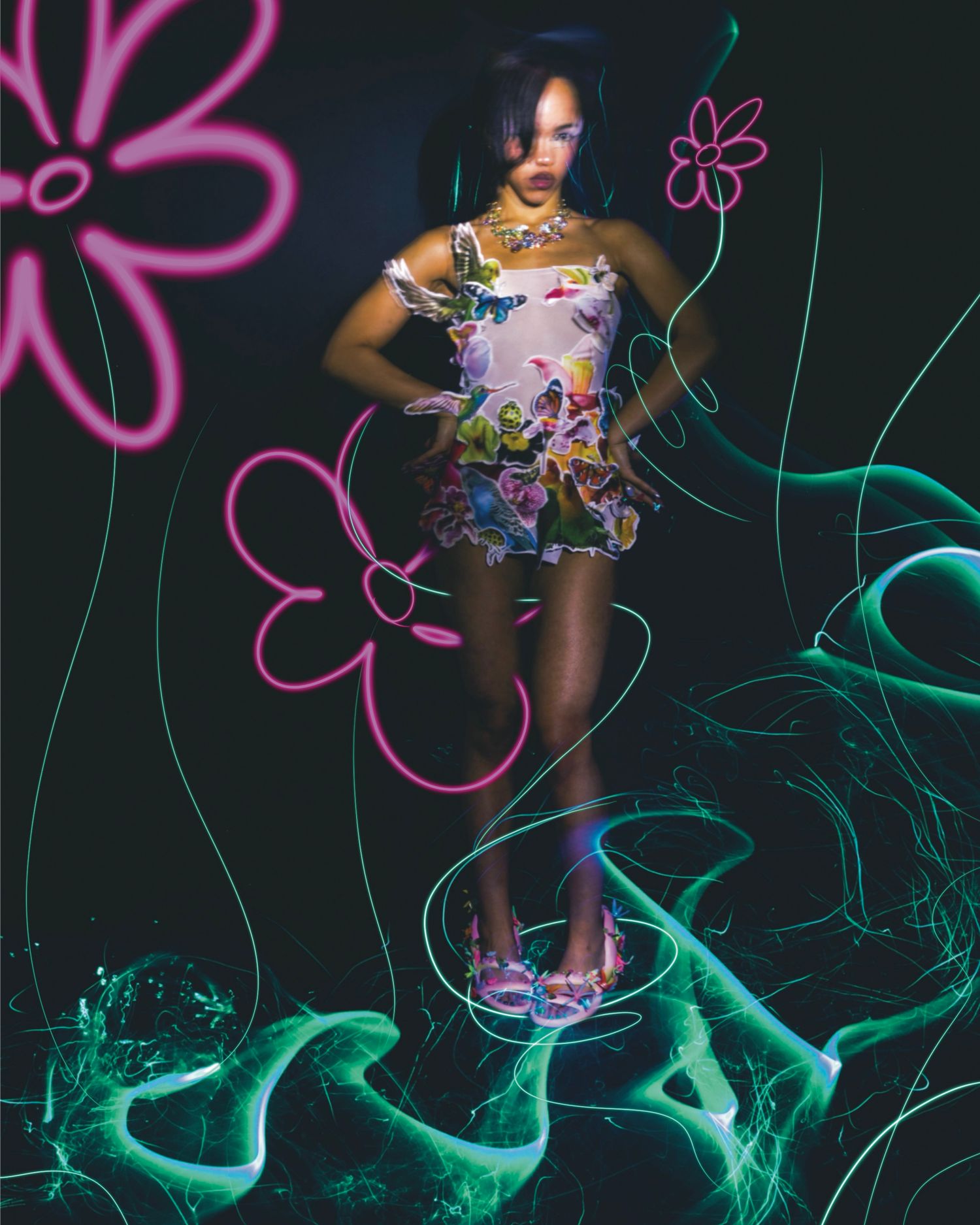 Artistic portrait with neon pink floral designs and turquoise smoke effects creating a dreamy underwater atmosphere.