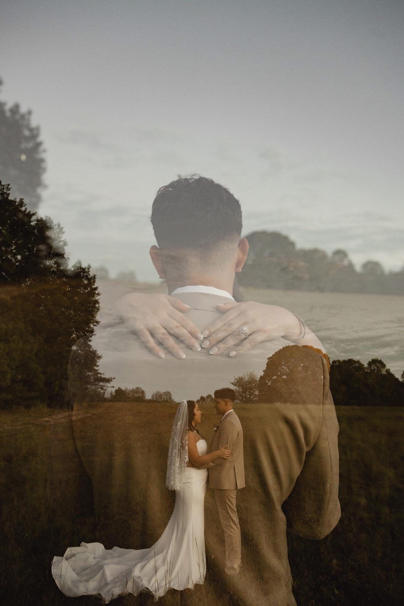 Double exposure wedding photo blending couple kissing in field with groom portrait, bride in white gown with veil.