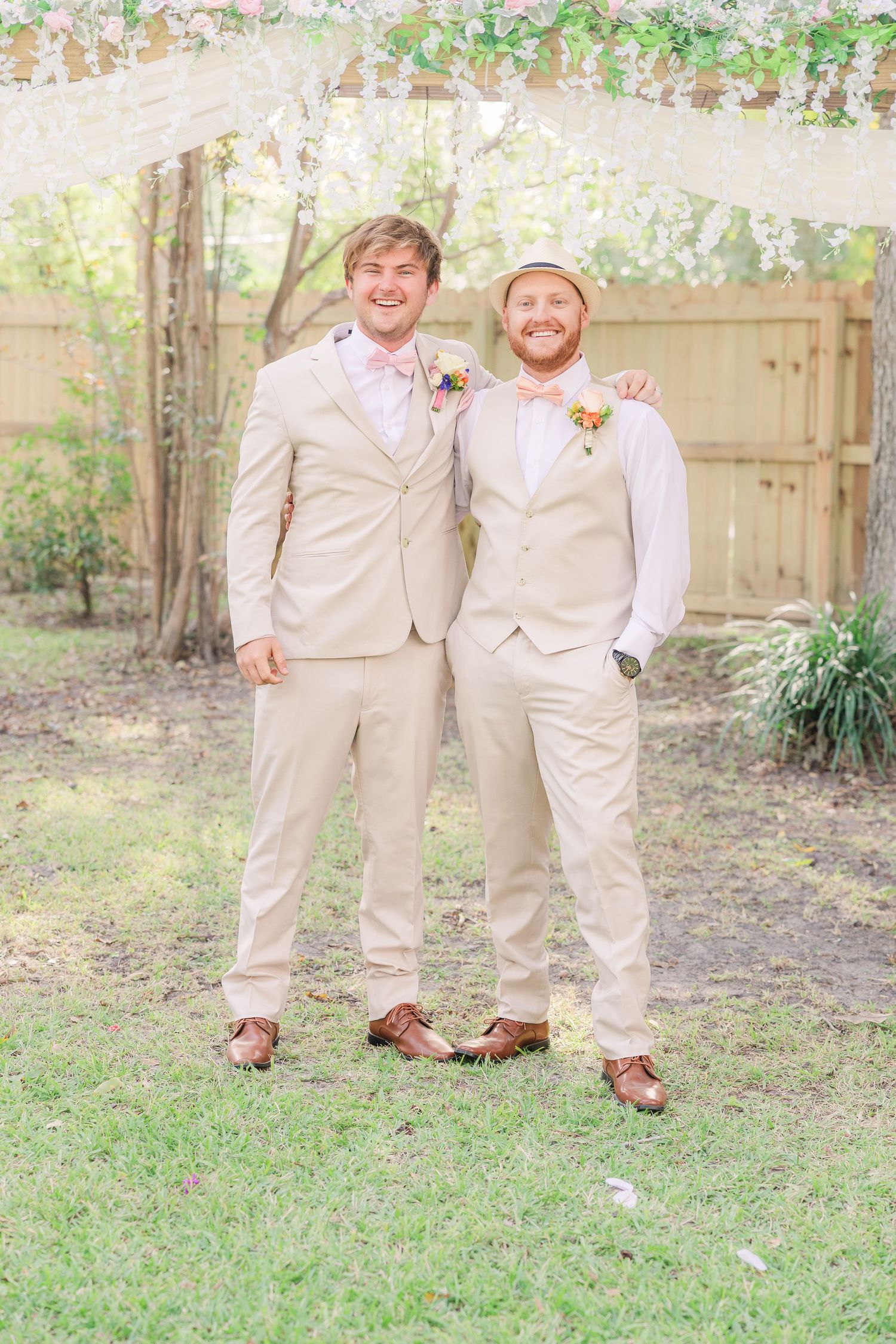 Groomsmen in matching khaki suits wedding groom bride wilmington photographer light and airy classic Wrightsville Beach