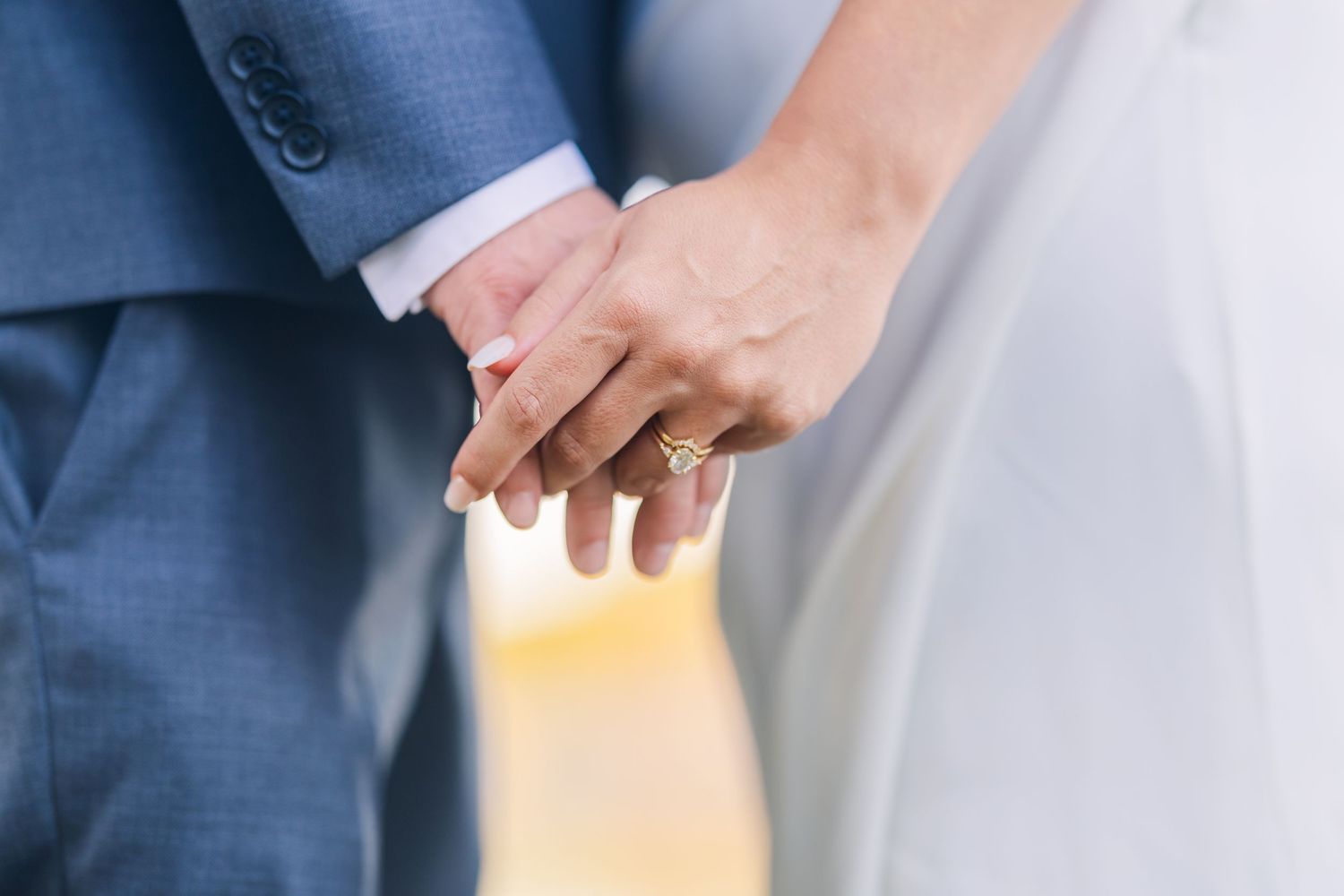 Detail shots of wedding attire and tender moments between the couple wedding groom bride lake Gaston photographer light airy