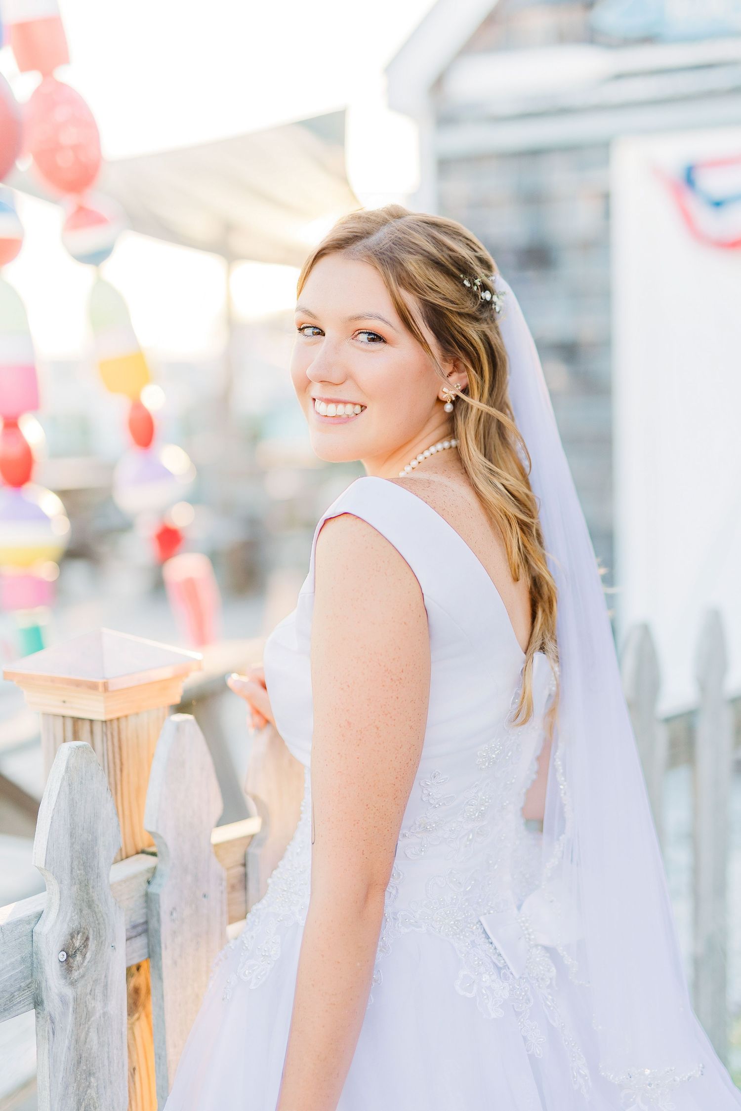Bride in white dress smiles outdoors southport elopement wedding bride groom light and airy classic wilmington Wrightsville