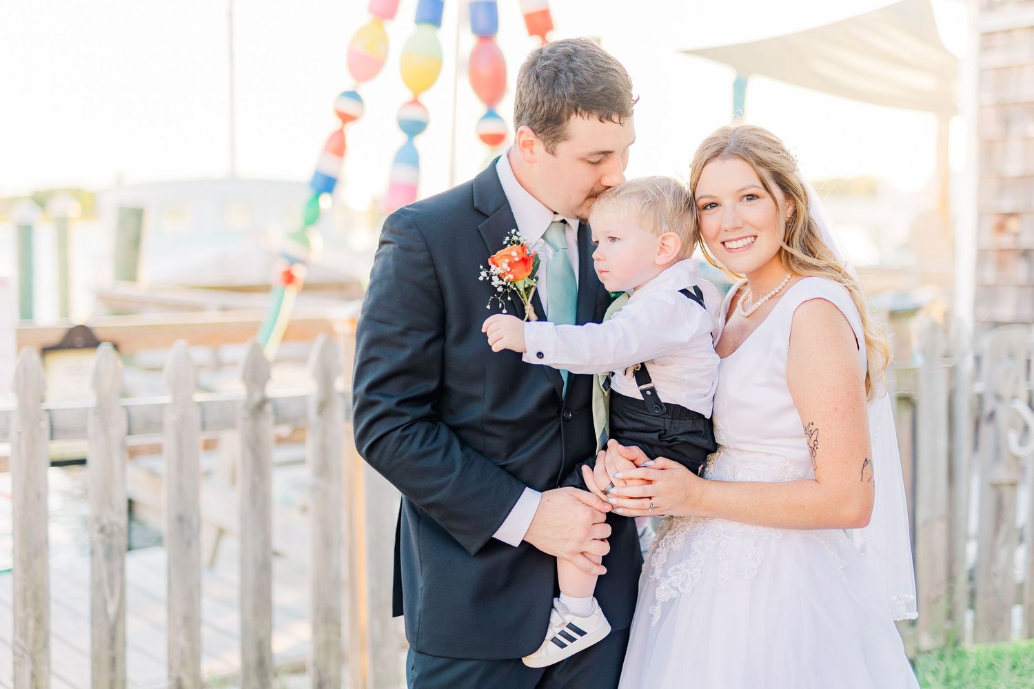 Outdoor wedding photos with colorful party southport elopement wedding bride groom light and airy classic